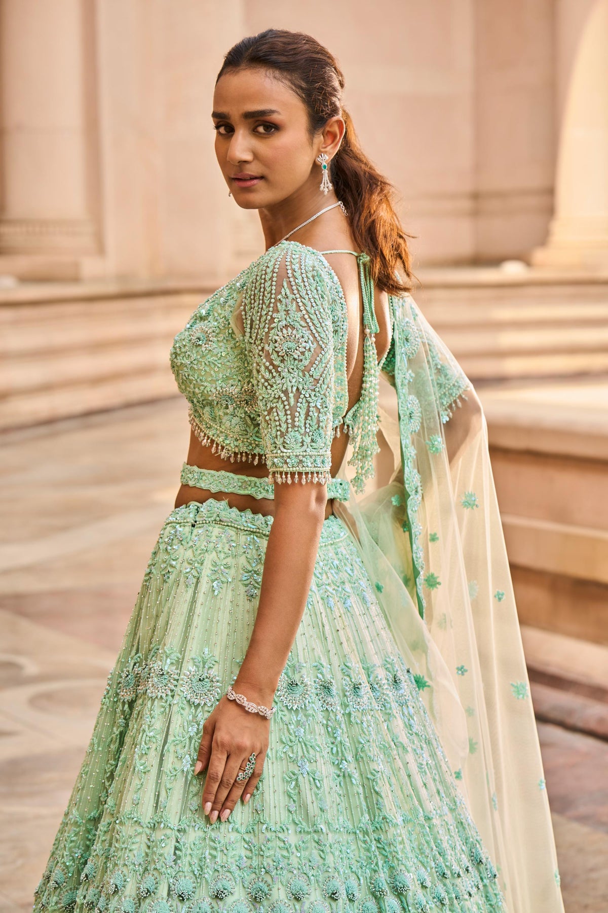 Vibrant Mint Green Tulle Lehenga Choli Dupatta with a Worked Belt