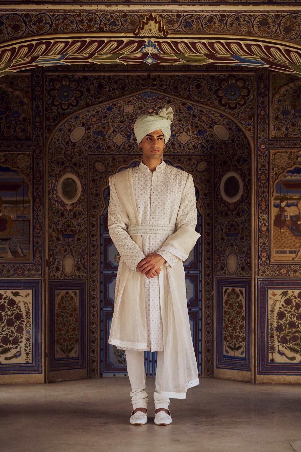 IVORY RAW SILK SHERWANI WITH KURTA CHURIDAR AND OPTIONAL STOLE, BELT AND EMBROIDERED JUTIS