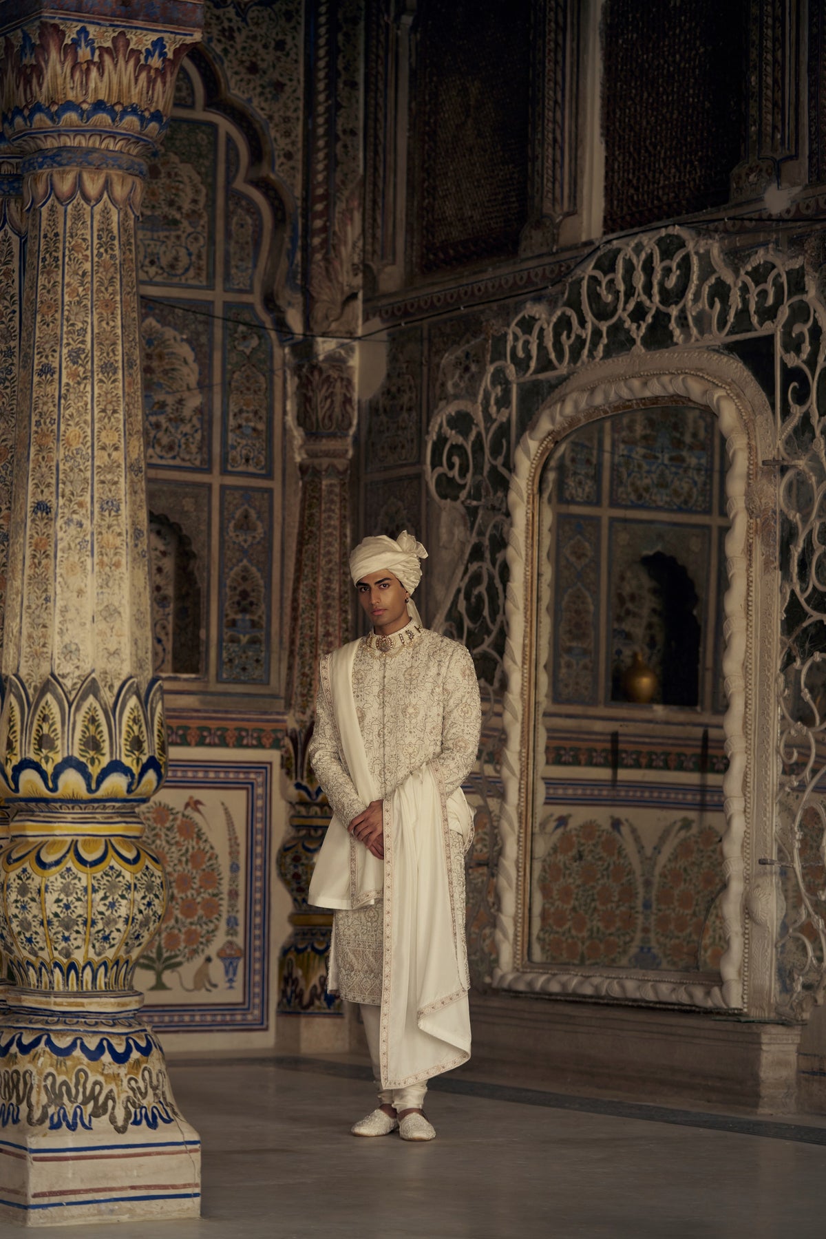 IVORY AND BEIGE RAW SILK SHERWANI SET WITH KURTA AND CHURIDAR WITH OPTIONAL BELT, STOLE AND JUTIS