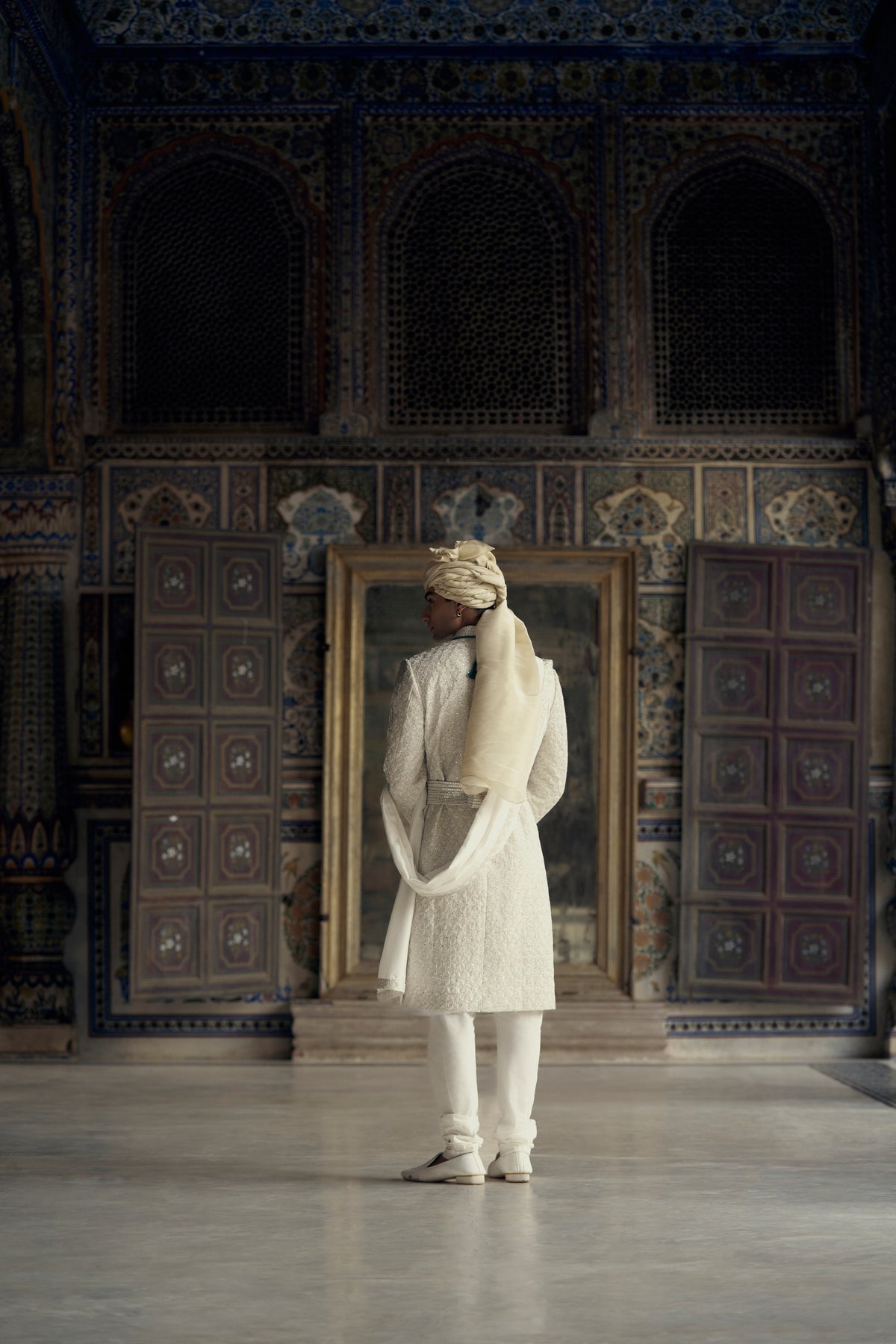 IVORY RAW SILK SHERWANI WITH KURTA AND CHURIDAR WITH OPTIONAL WORKED STOLE, BELT AND EMBROIDERED JUTIS