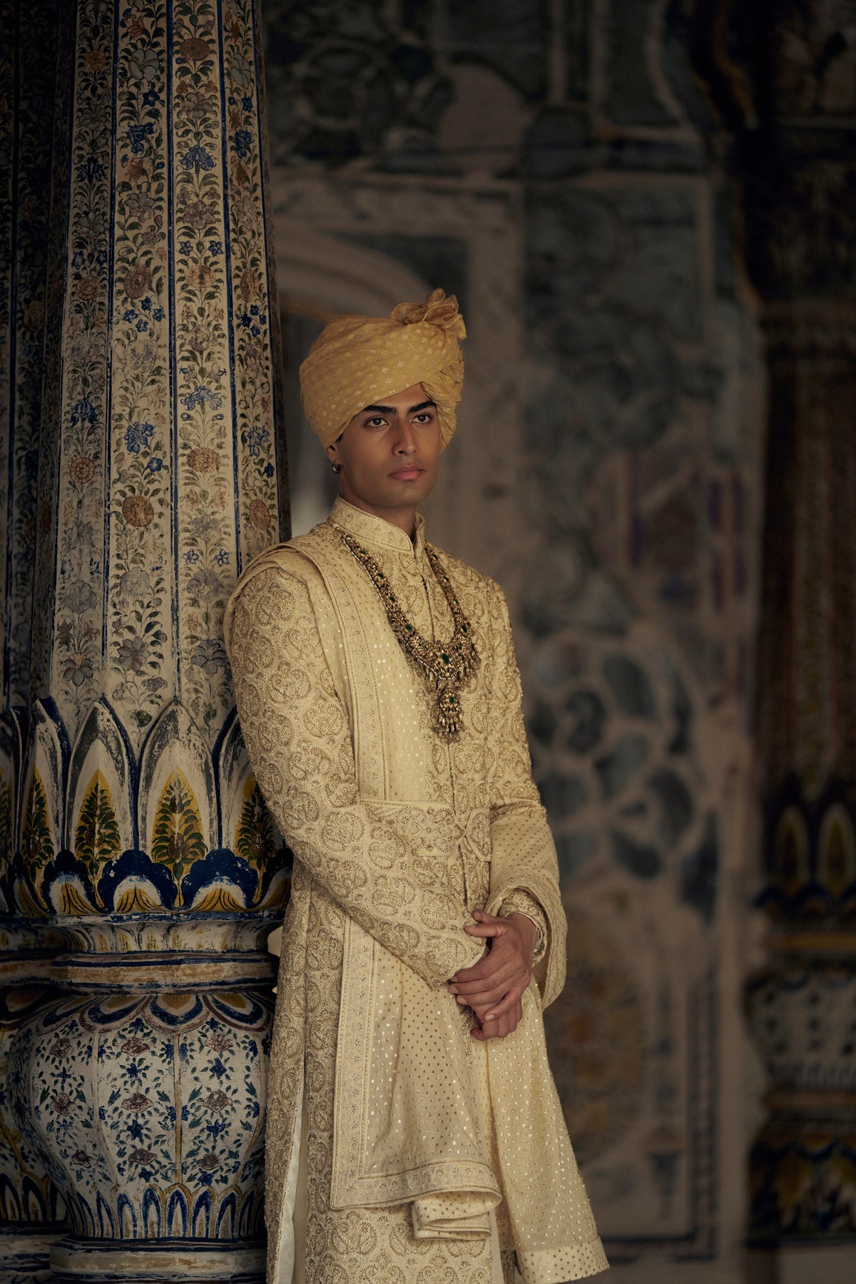 GOLD RAW SILK SHERWANI WITH KURTA AND CHURIDAR WITH OPTIONAL WORKED BELT, STOLE AND JUTIS