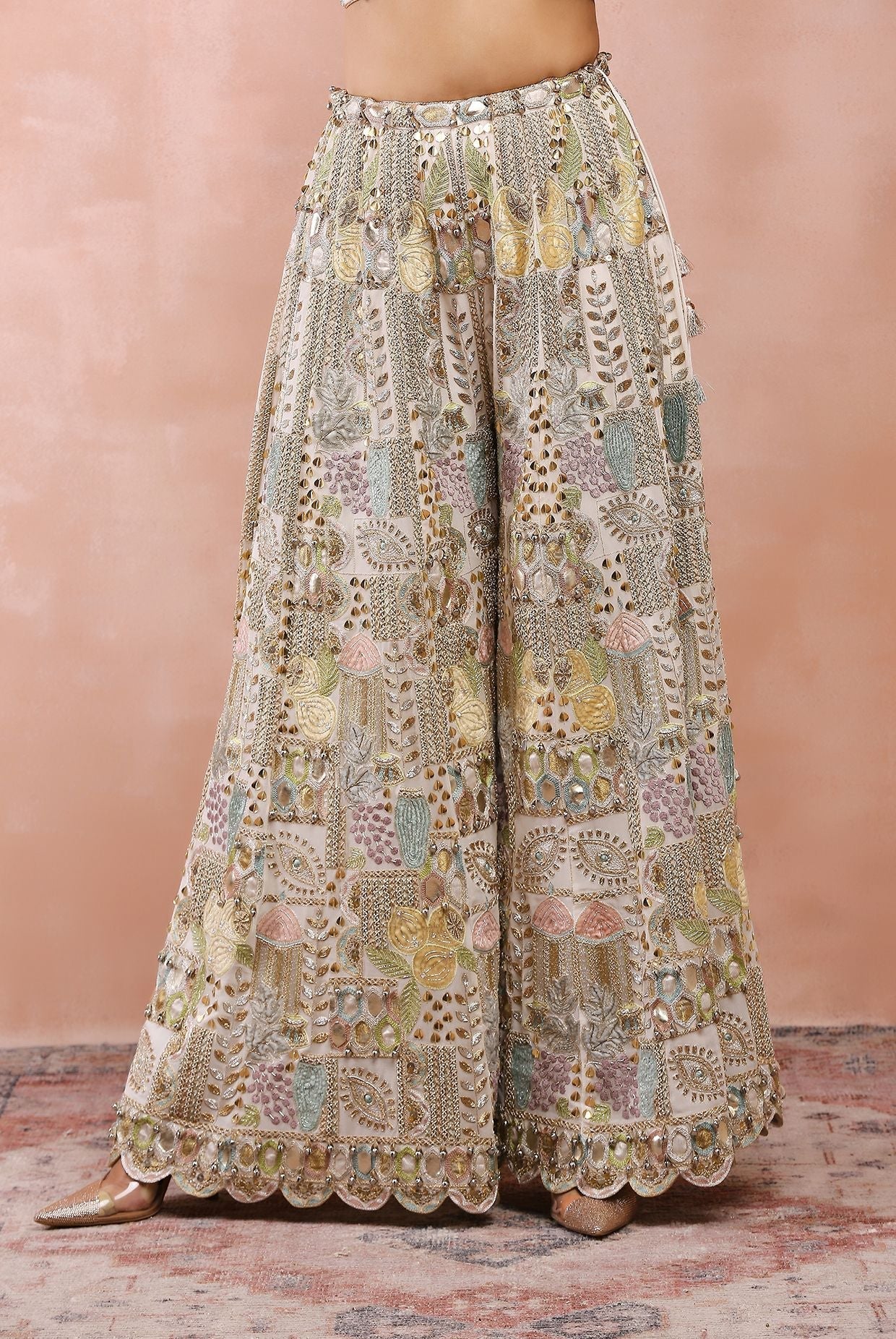 Off white applique embroidered choli with sharara and dupatta