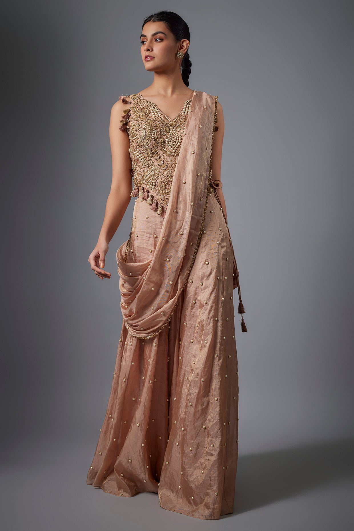 Dull Rose Tissue Embroidered Tissue Choli And Embroidred Sharara With Pallu.
