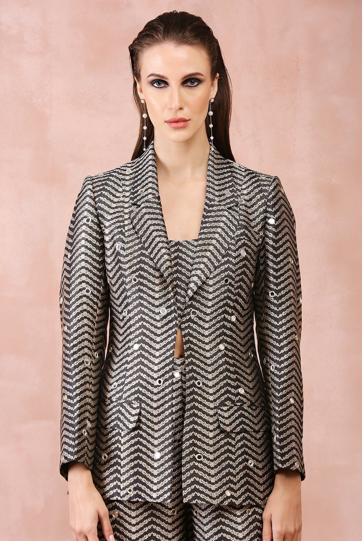 Black embroidered blazer with bustier and pant.