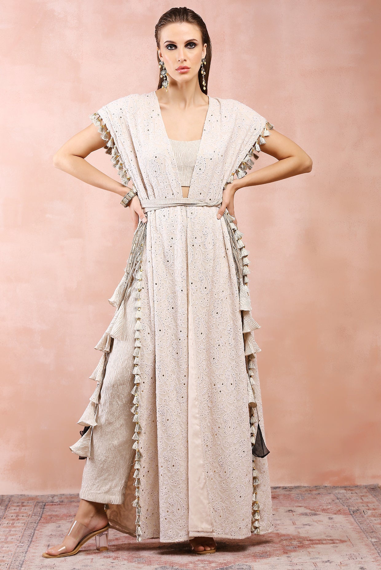 Cream jacket with silver tissue bustier and pant.