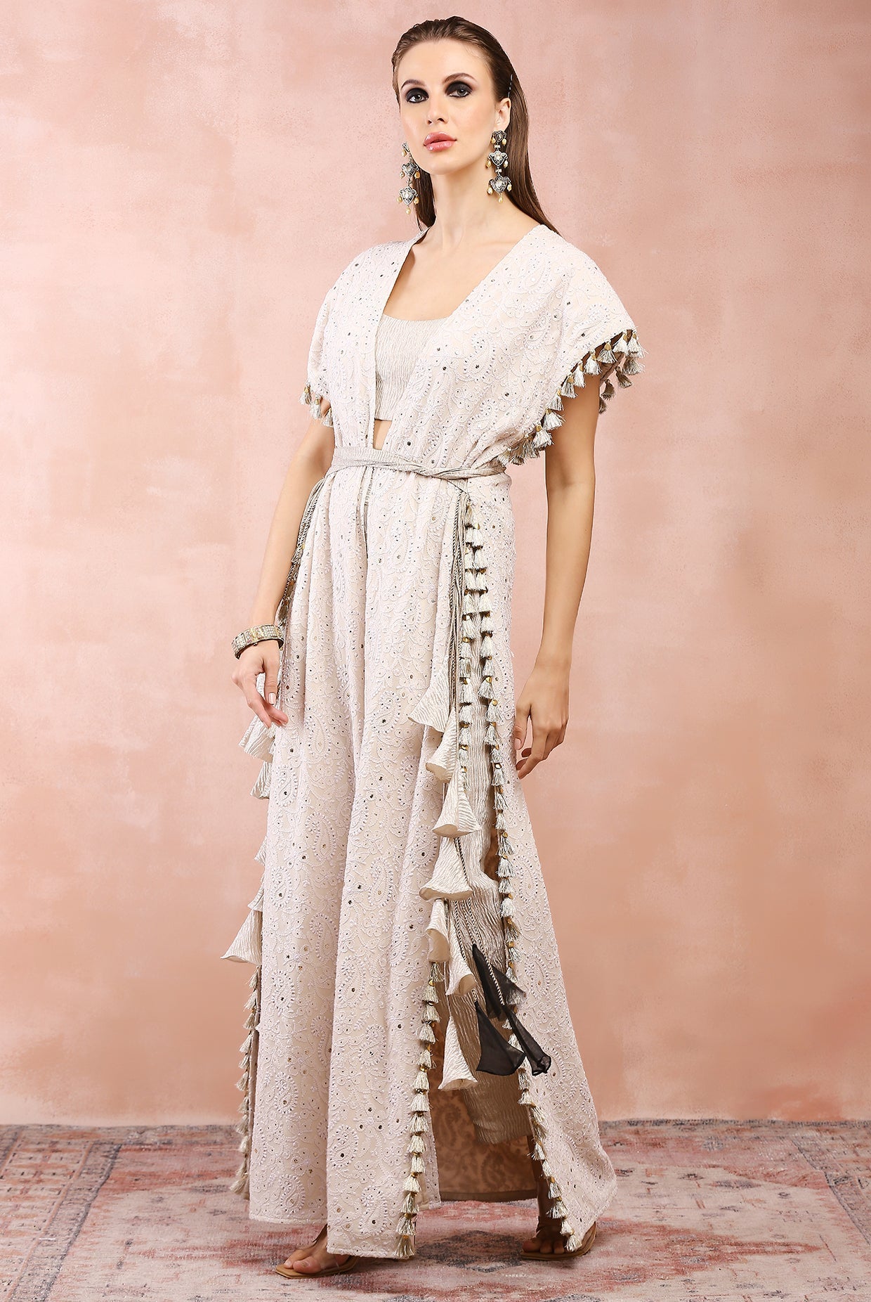 Cream jacket with silver tissue bustier and pant.