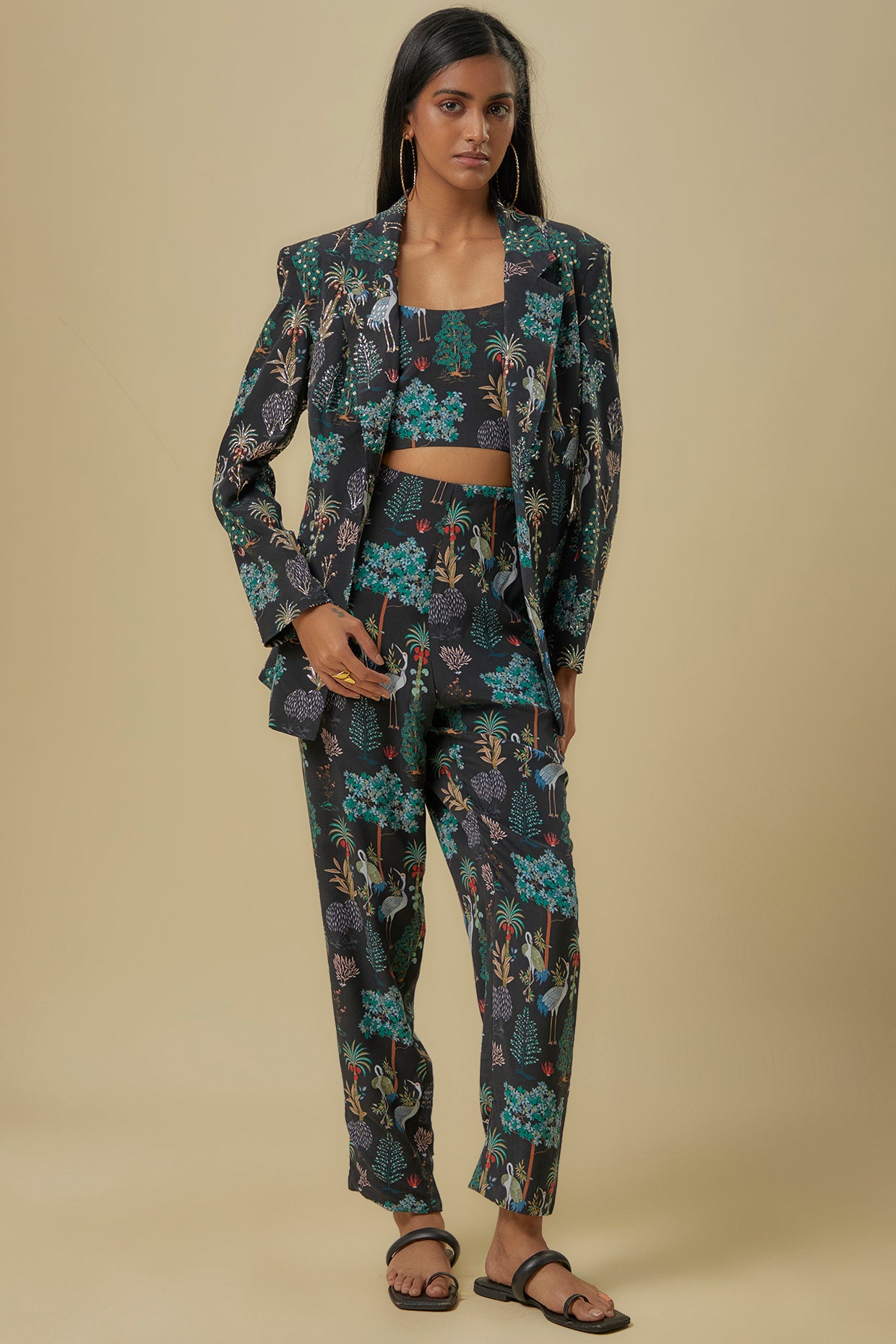 Black Crane Print Lifted Jacket With Plain Bustier And Pants.