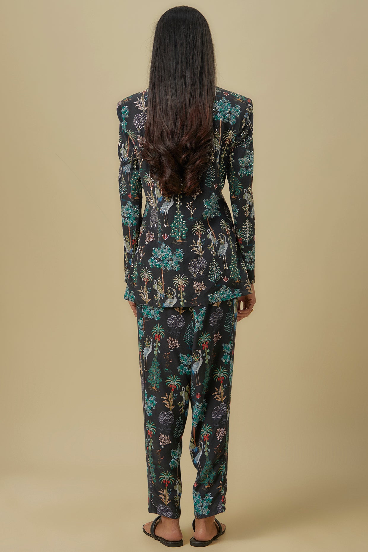 Black Crane Print Lifted Jacket With Plain Bustier And Pants.