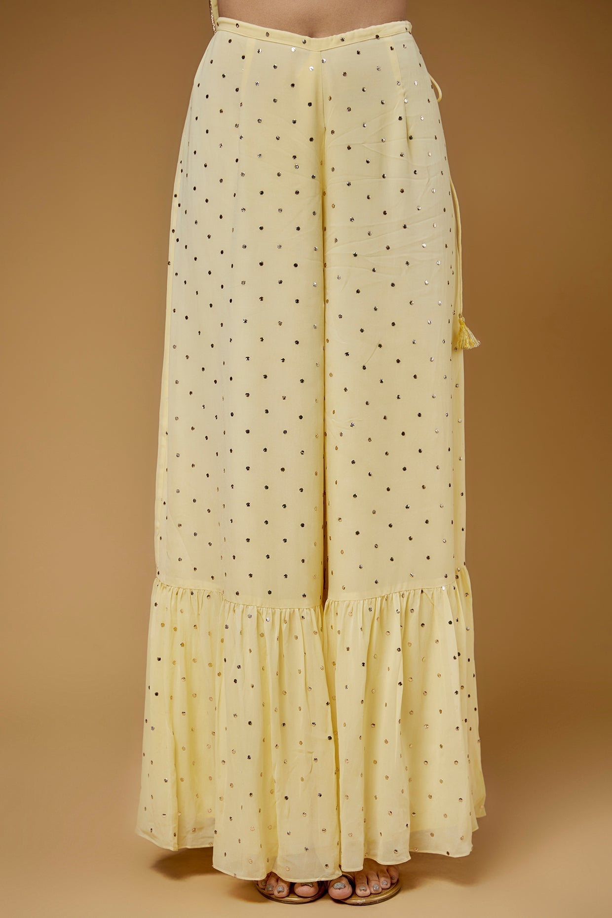 Pale Yellow Embroidered Back Tie-Up Kurta With One Frill Sharara And Dupatta