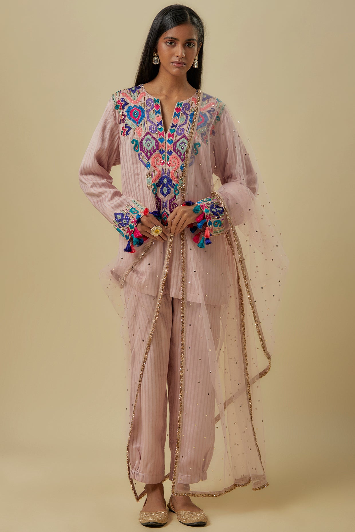 Onion Pink Stripes Chanderi Embroidered Yoke Short Kurta And Jogger Pants With Mukaish Net Dupatta.
