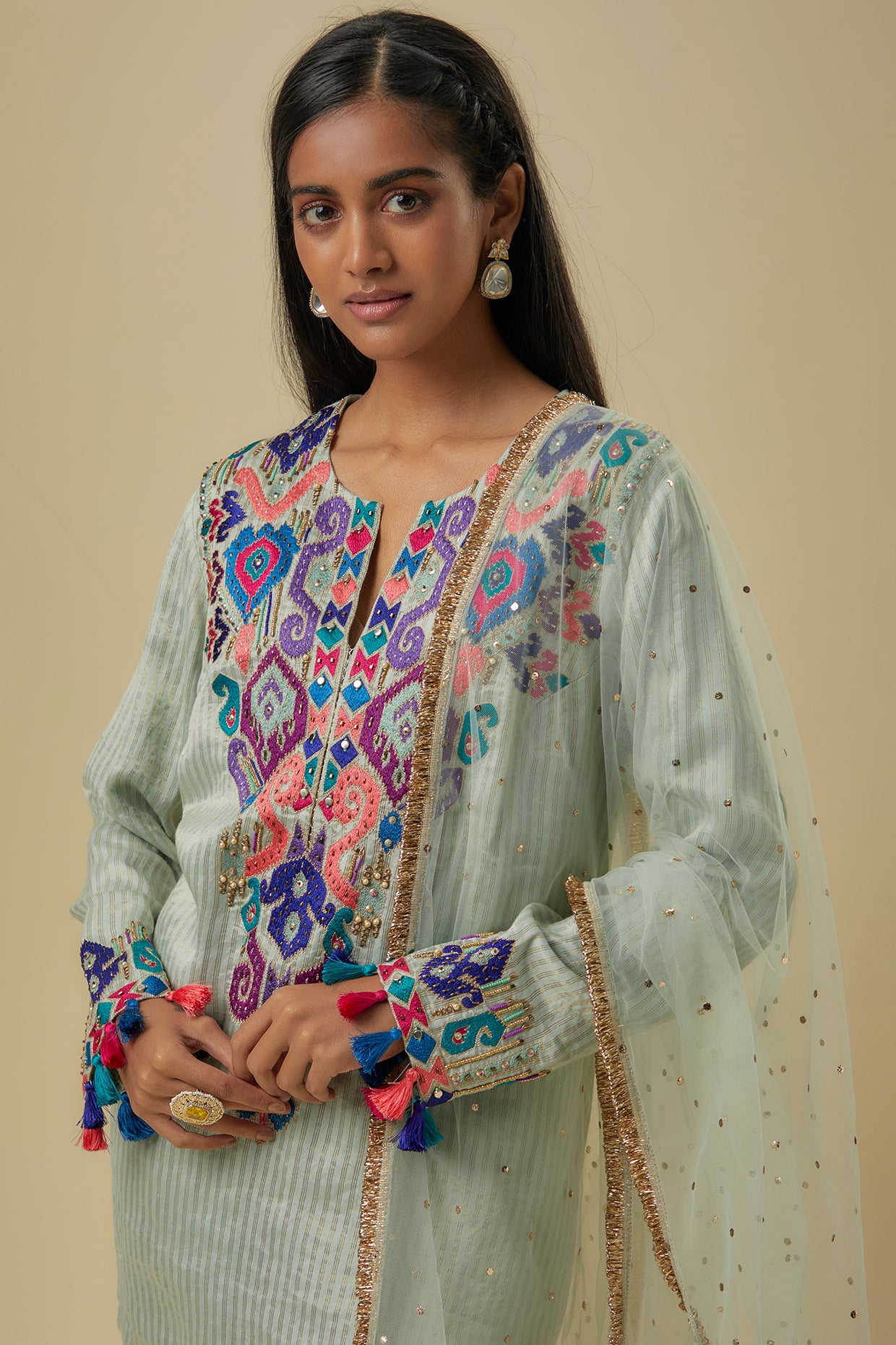 Pale Blue Gold Stripes Chanderi Embroidered Yoke Short Kurta And Jogger Pants With Mukaish Net Dupatta.