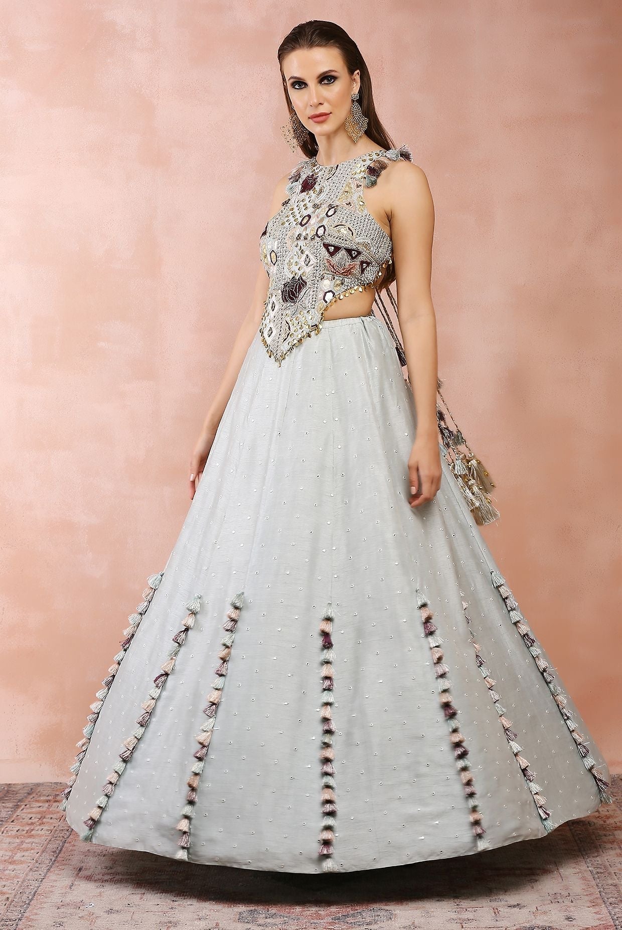Powder blue applique embroidered choli with lehenga.