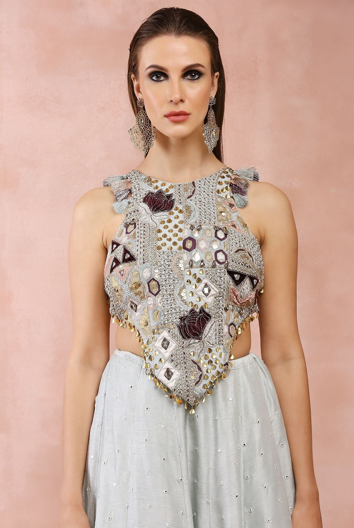 Powder blue applique embroidered choli with lehenga.