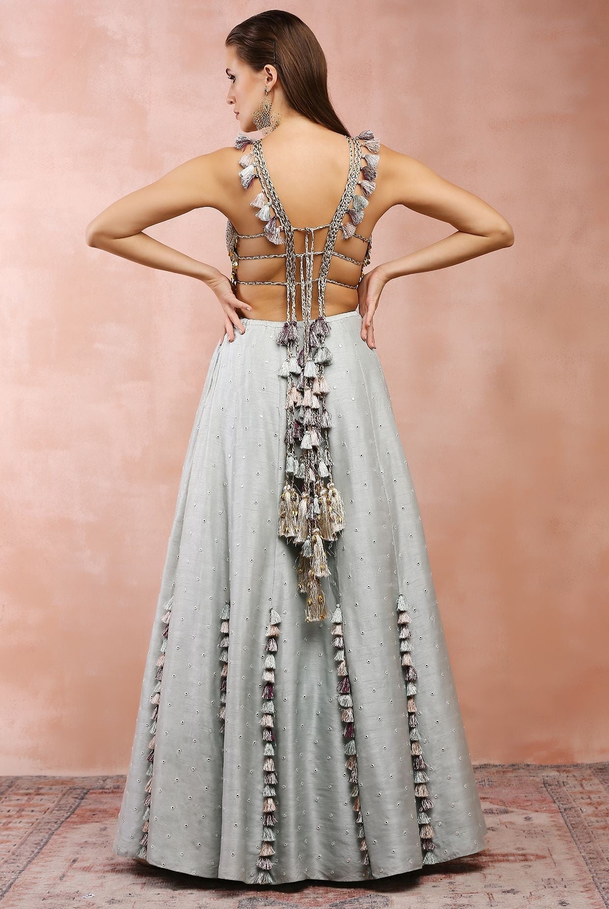 Powder blue applique embroidered choli with lehenga.