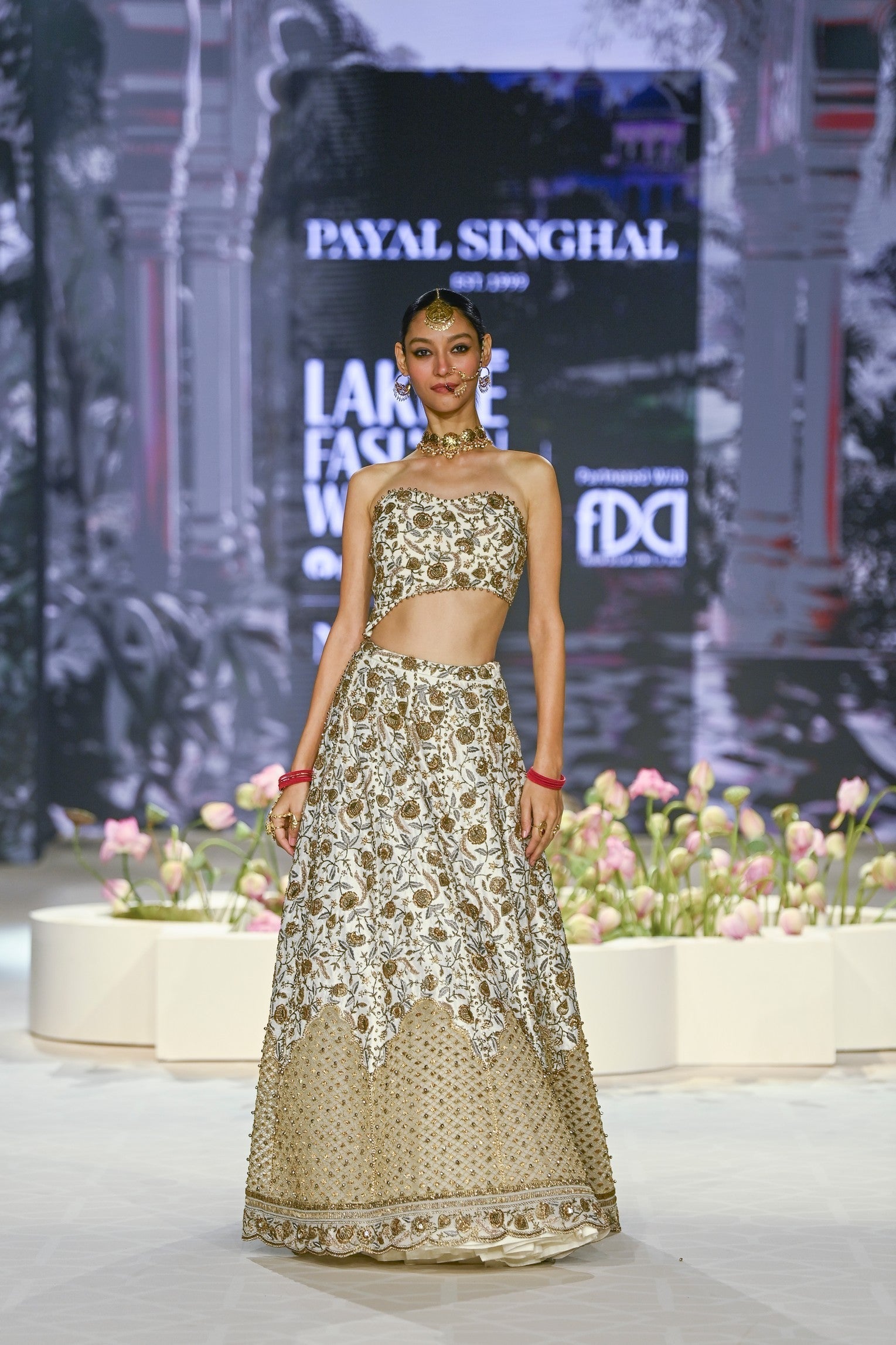 Aasma Off White Embroidered Choli And Lehenga