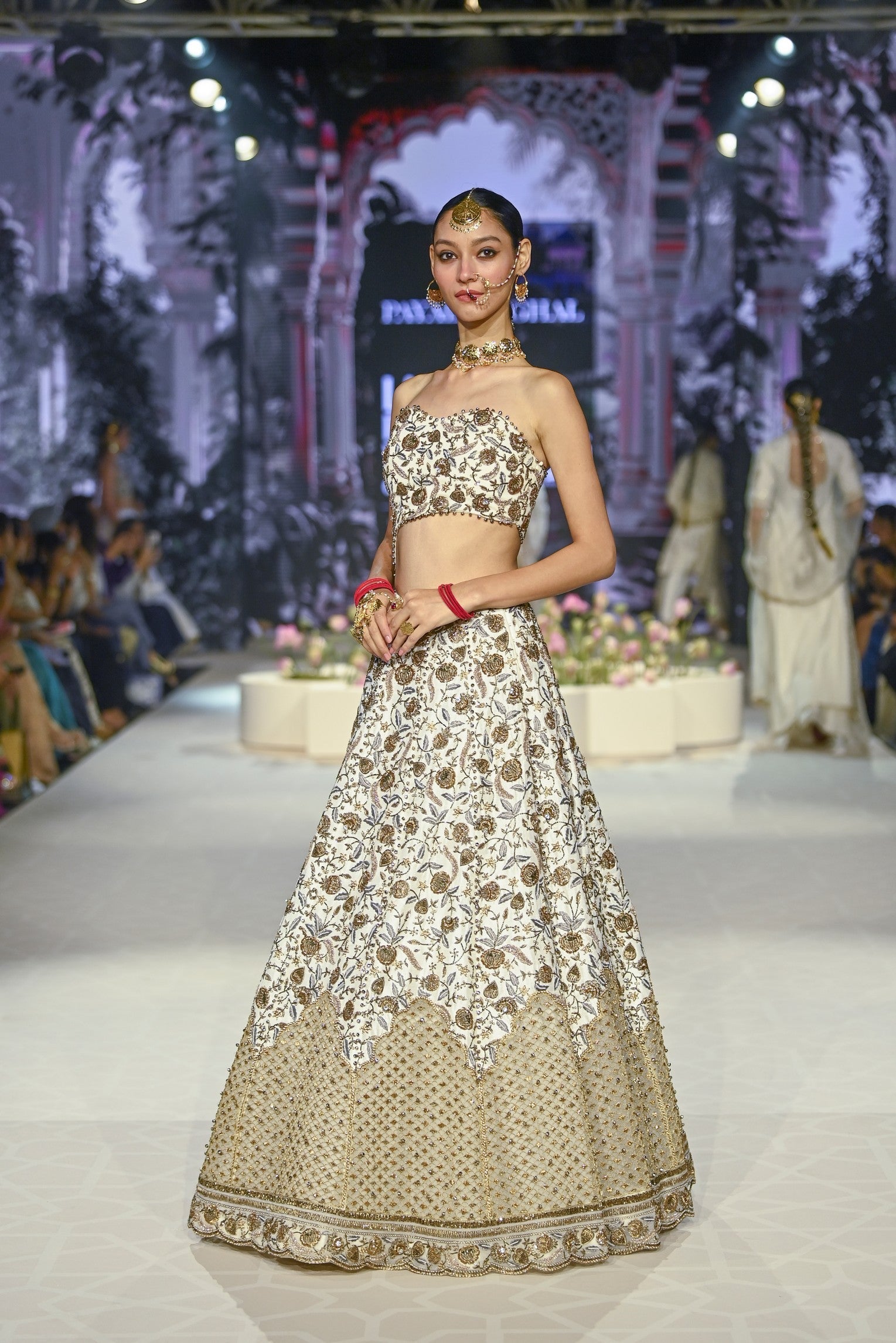 Aasma Off White Embroidered Choli And Lehenga