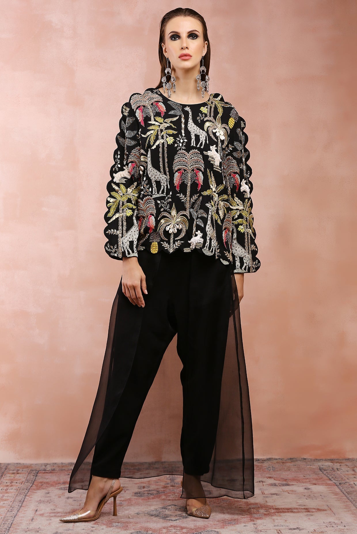 Black embroidered top and jogger pant with attached overlay