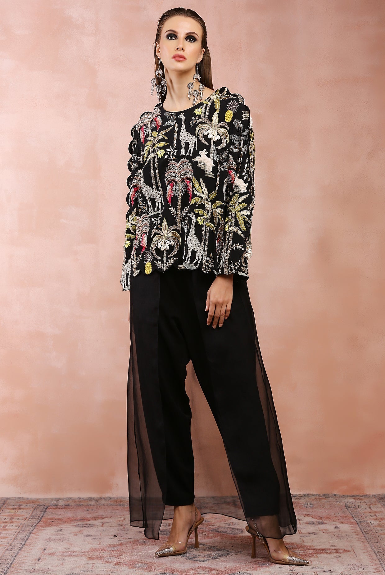 Black embroidered top and jogger pant with attached overlay