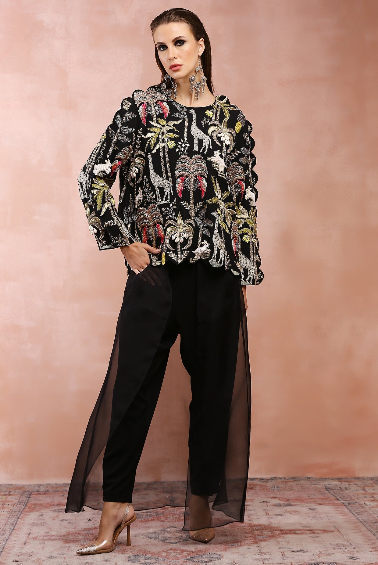 Black embroidered top and jogger pant with attached overlay