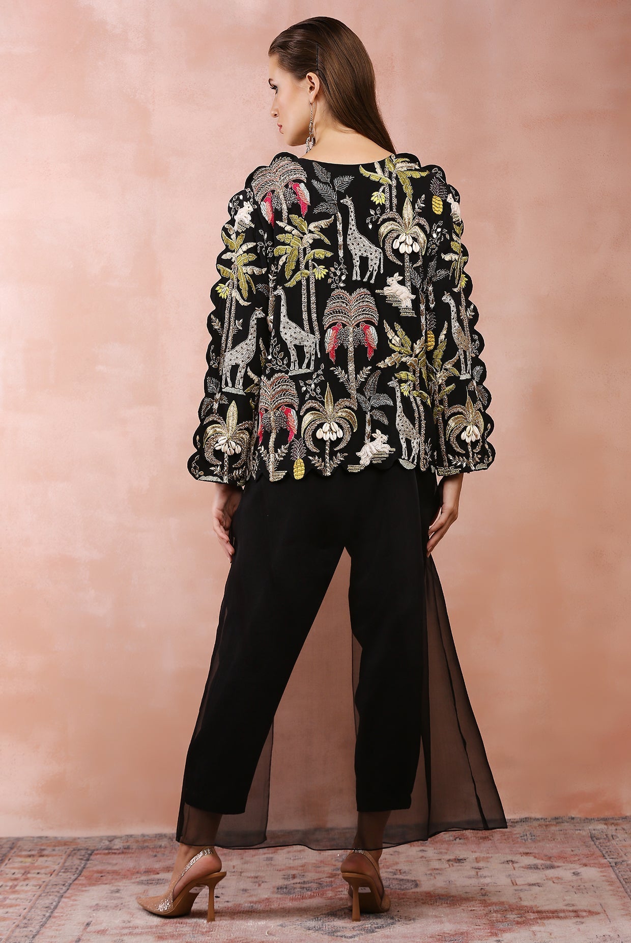 Black embroidered top and jogger pant with attached overlay