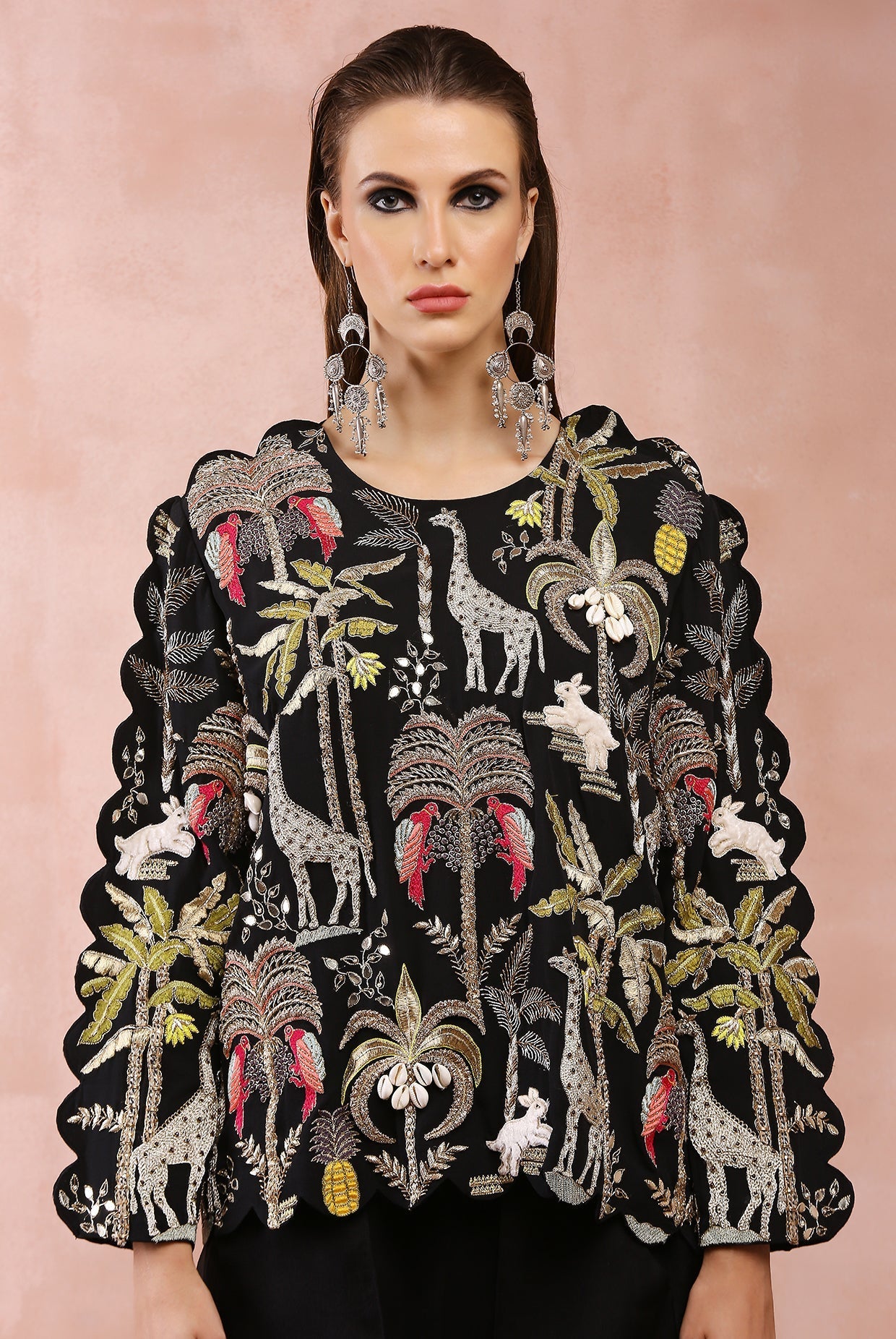 Black embroidered top and jogger pant with attached overlay