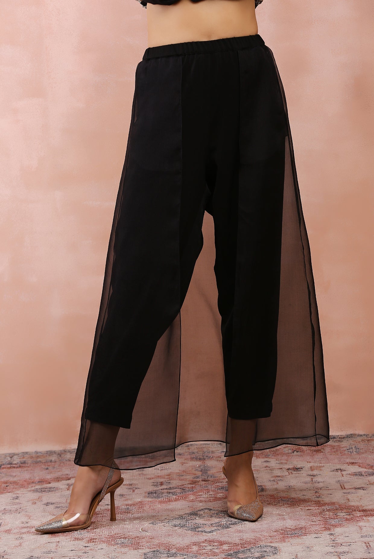 Black embroidered top and jogger pant with attached overlay