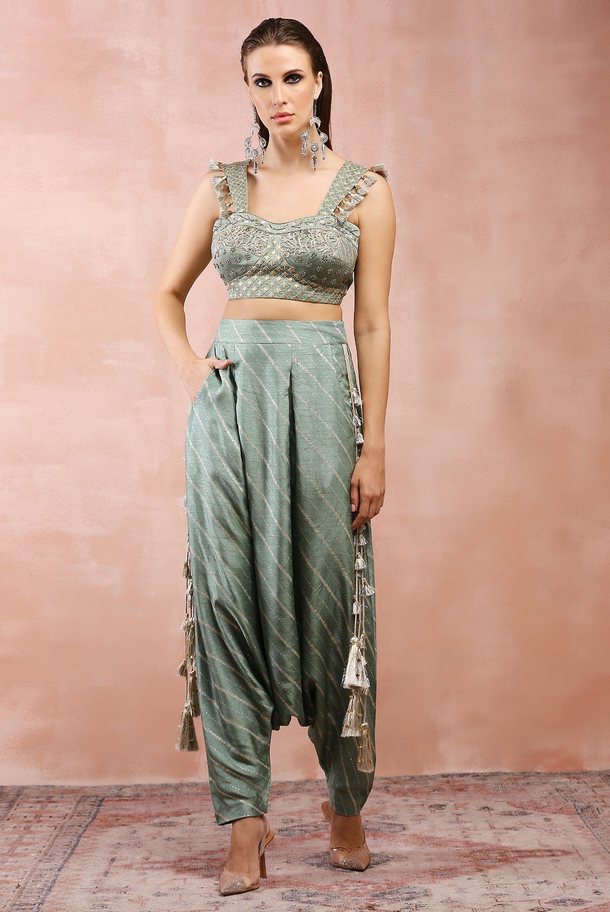 Sage green embroidered corset top with lowcrotch pant and side tassels