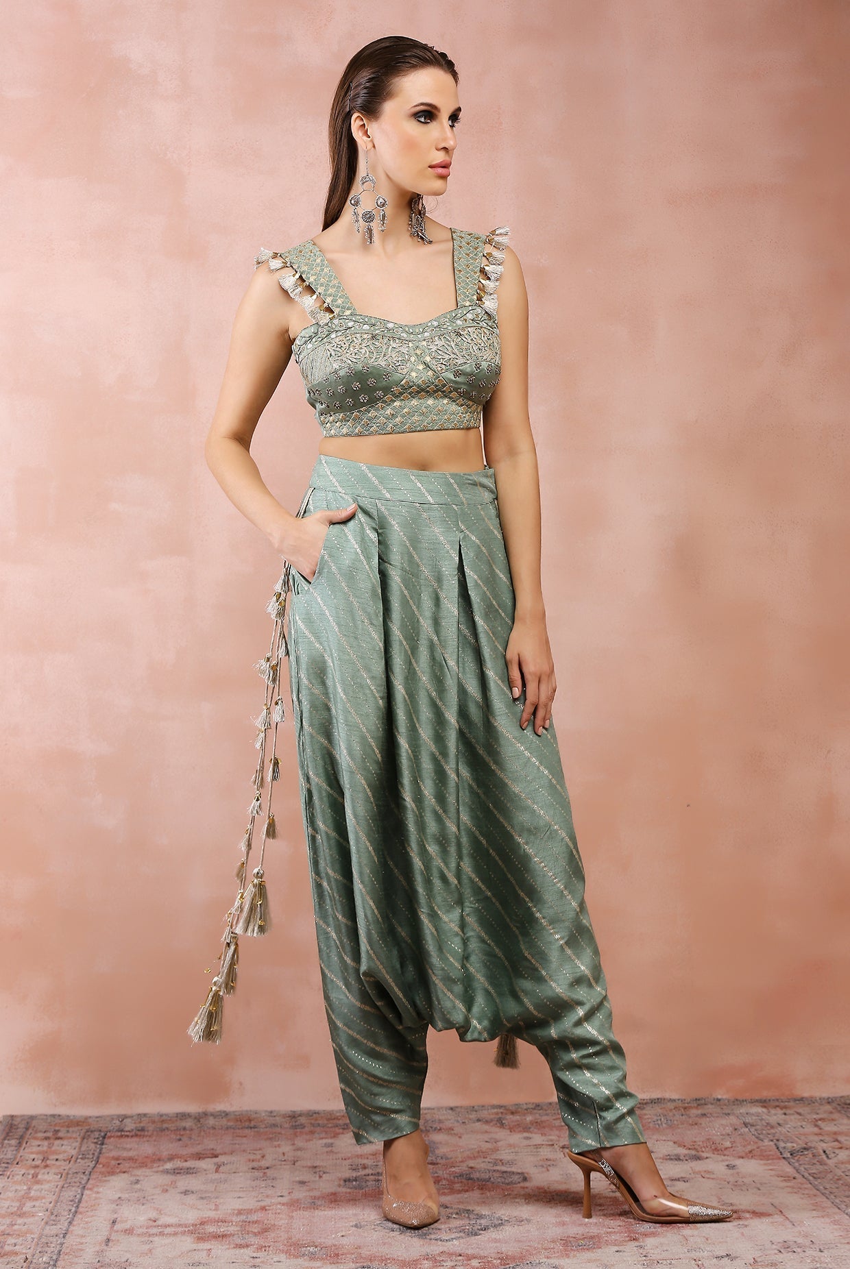 Sage green embroidered corset top with lowcrotch pant and side tassels