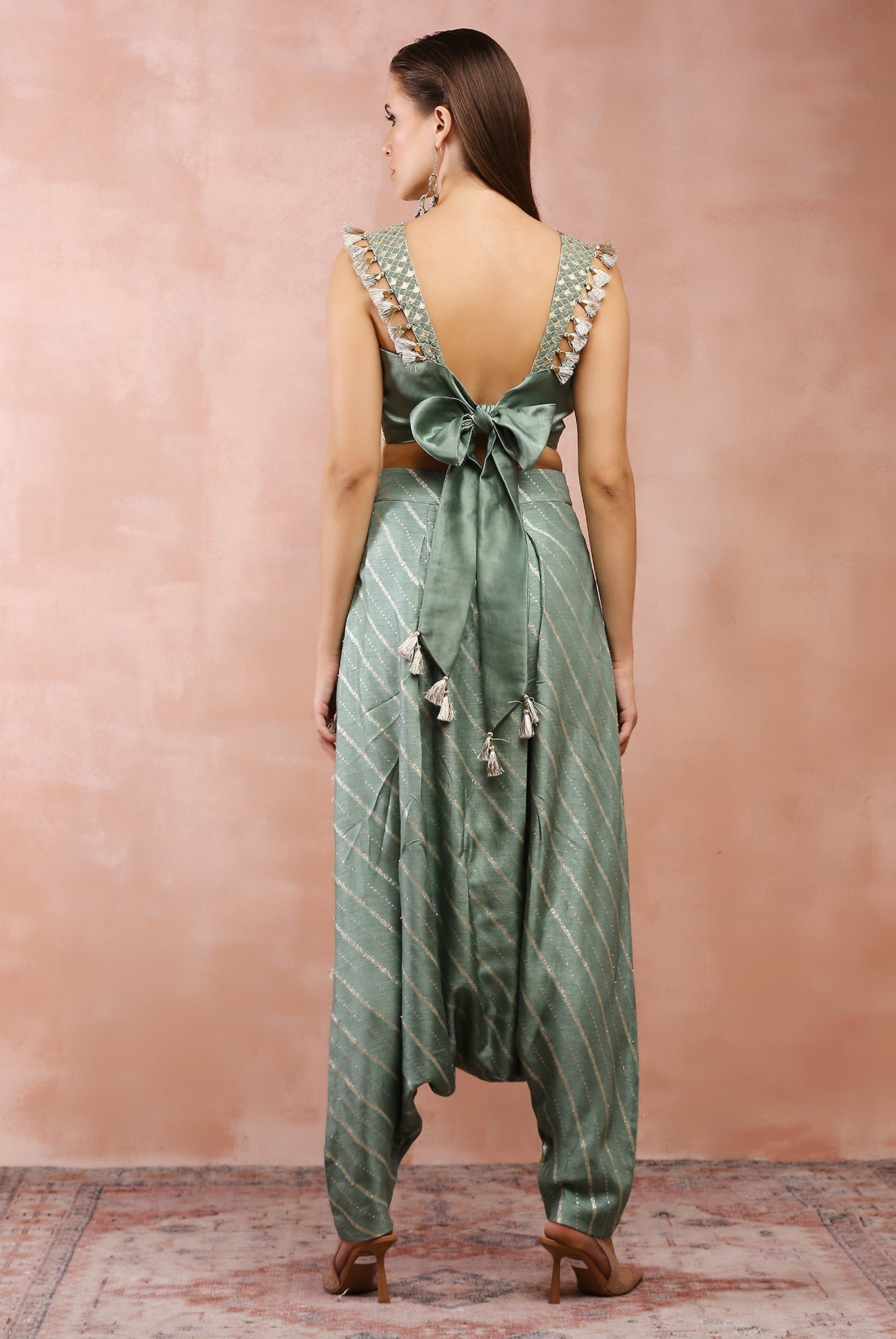 Sage green embroidered corset top with lowcrotch pant and side tassels