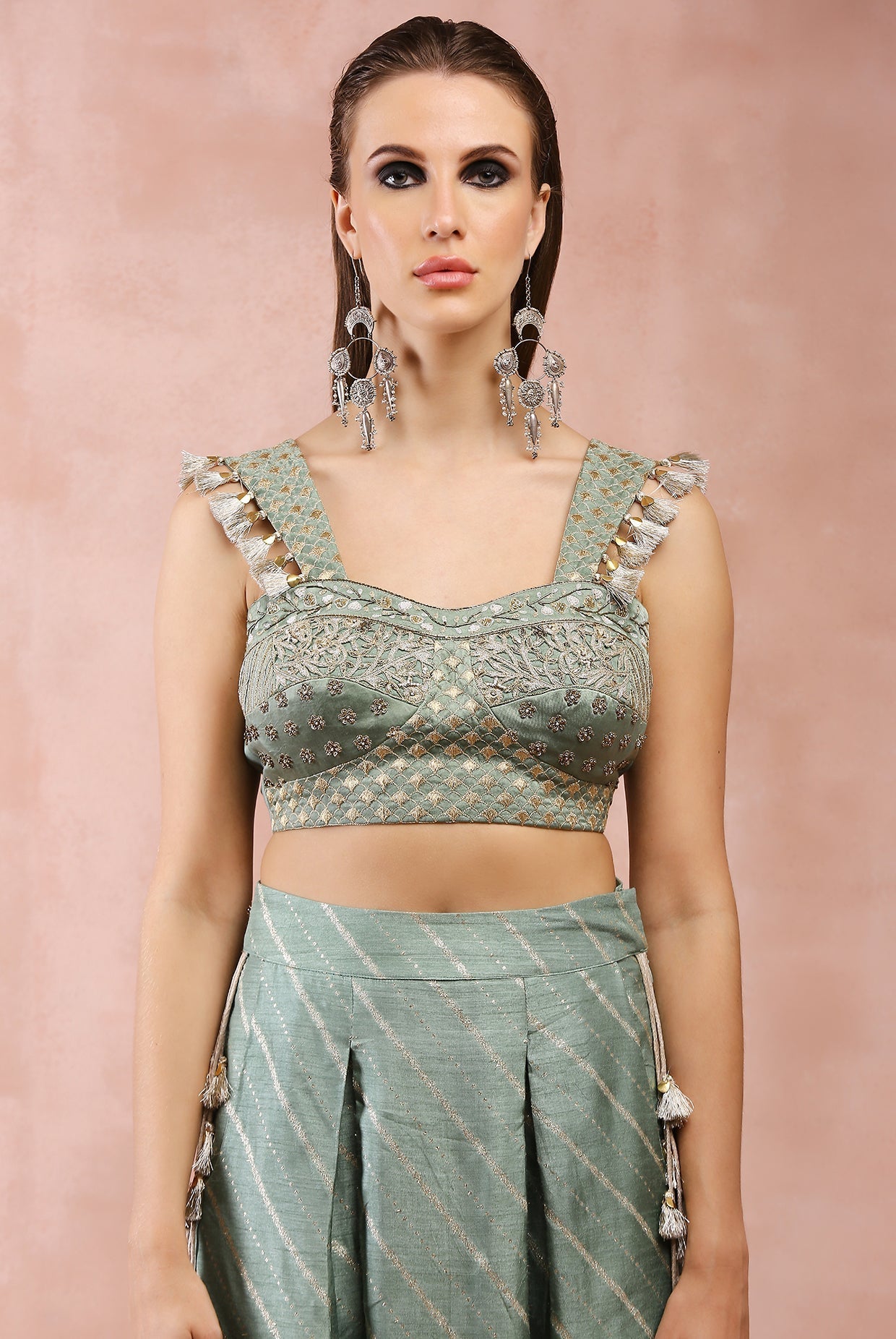 Sage green embroidered corset top with lowcrotch pant and side tassels