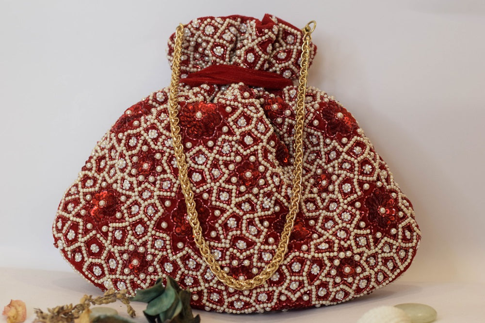 RAISA POTLI-RED
