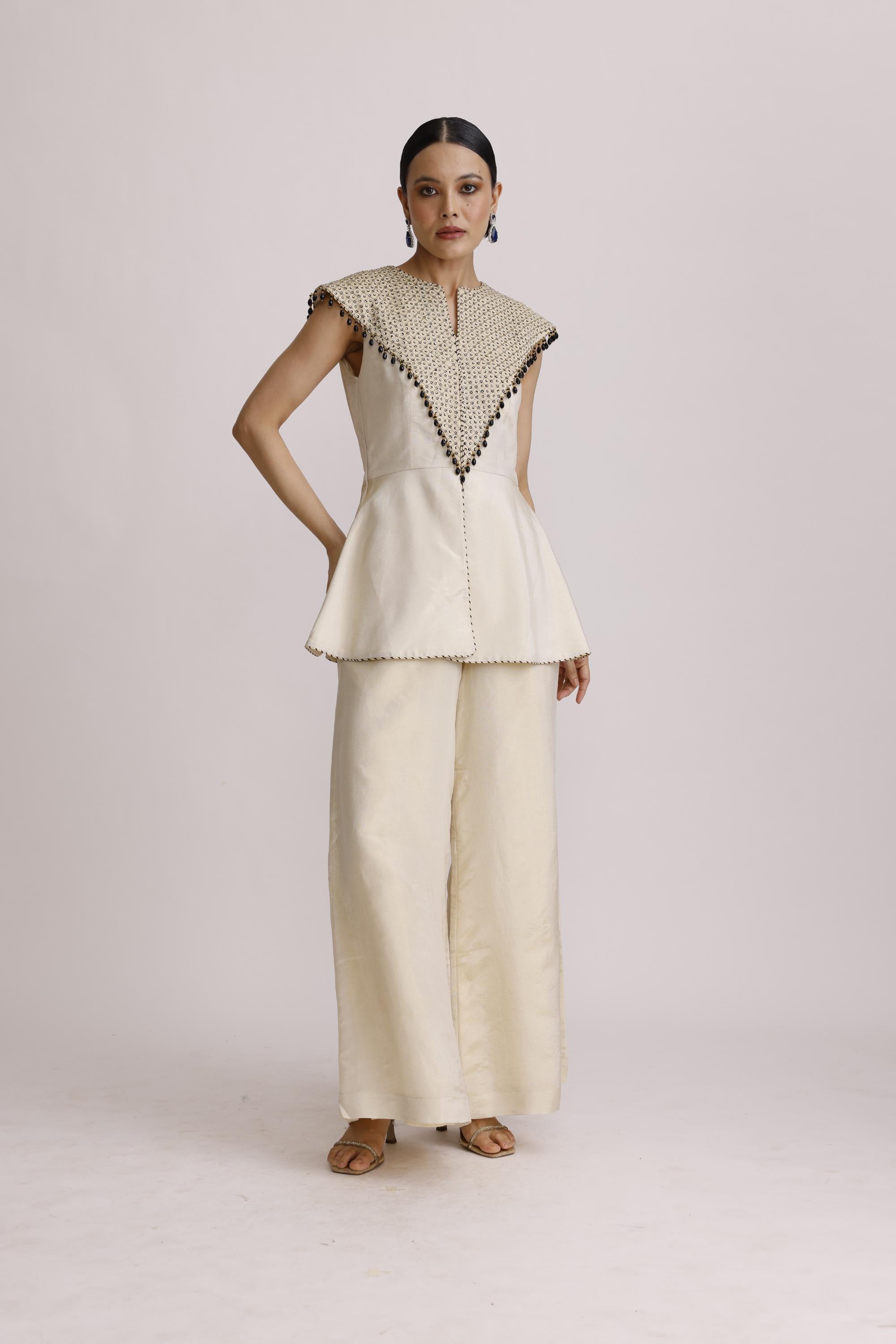 IVORY PAPLUM TOP WITH STRAIGHT PANTS