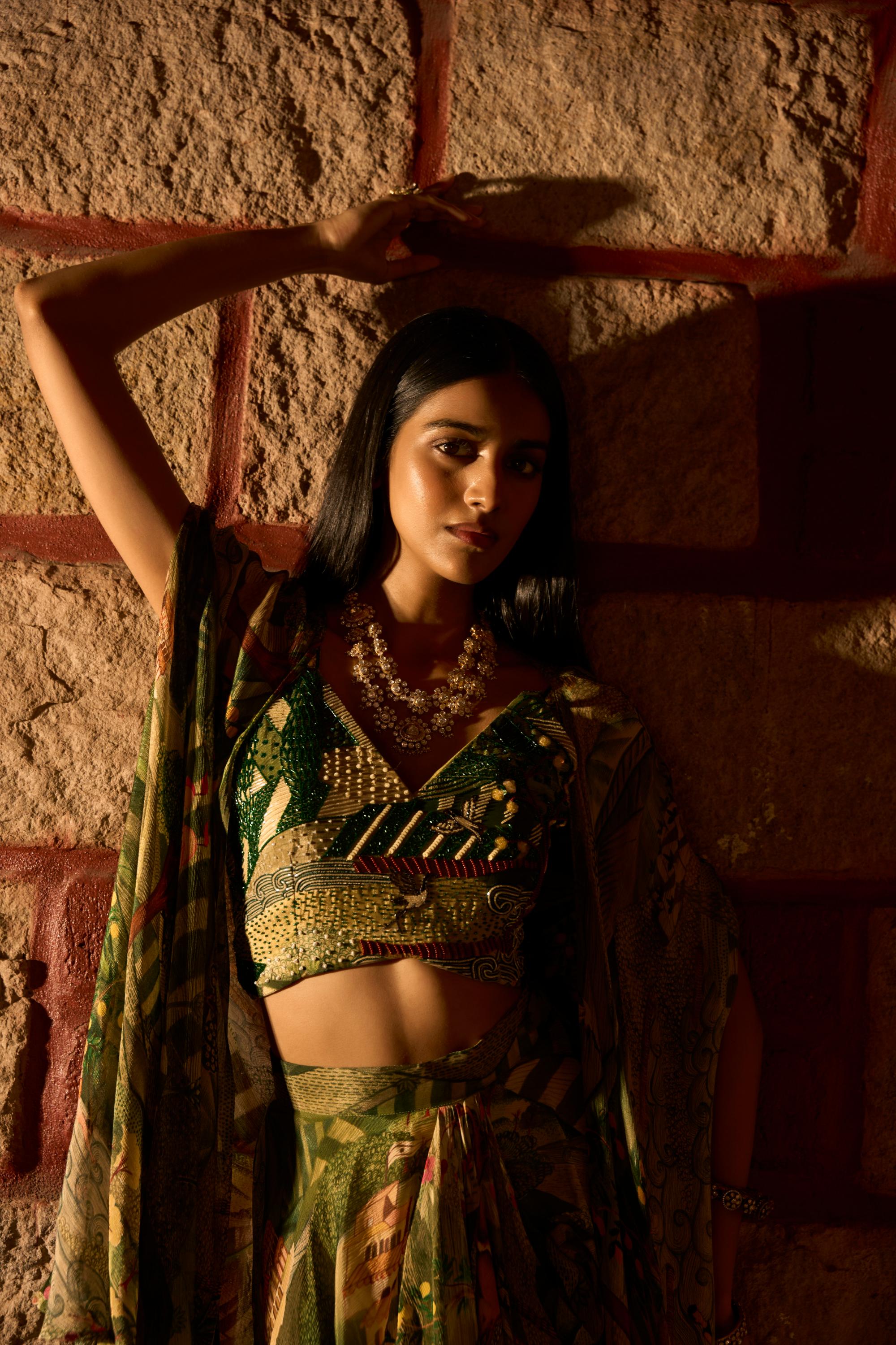 Enchanted Canopy ā Jungle Print Cowl Skirt Set with Handwork Blouse and Shrug