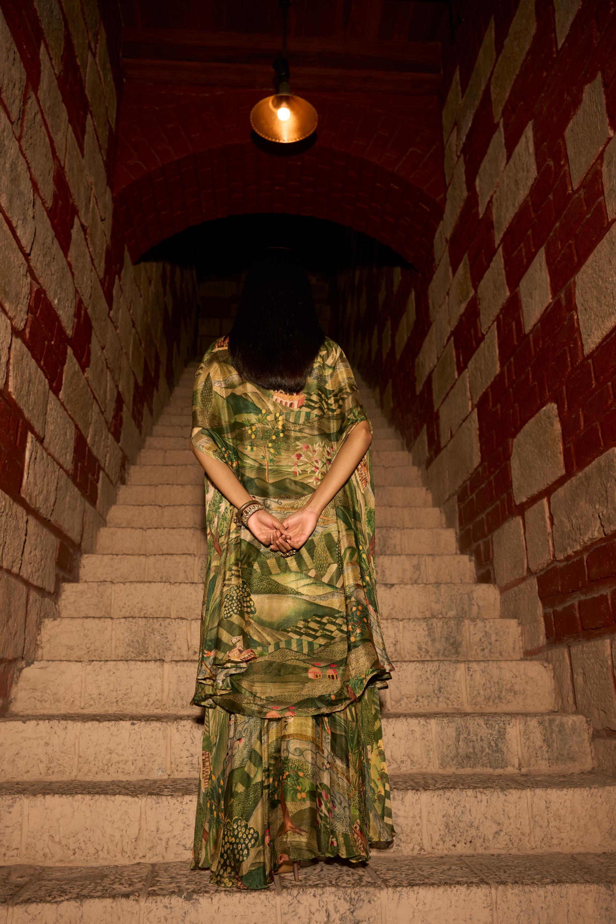 Enchanted Canopy ā Jungle Print Cowl Skirt Set with Handwork Blouse and Shrug
