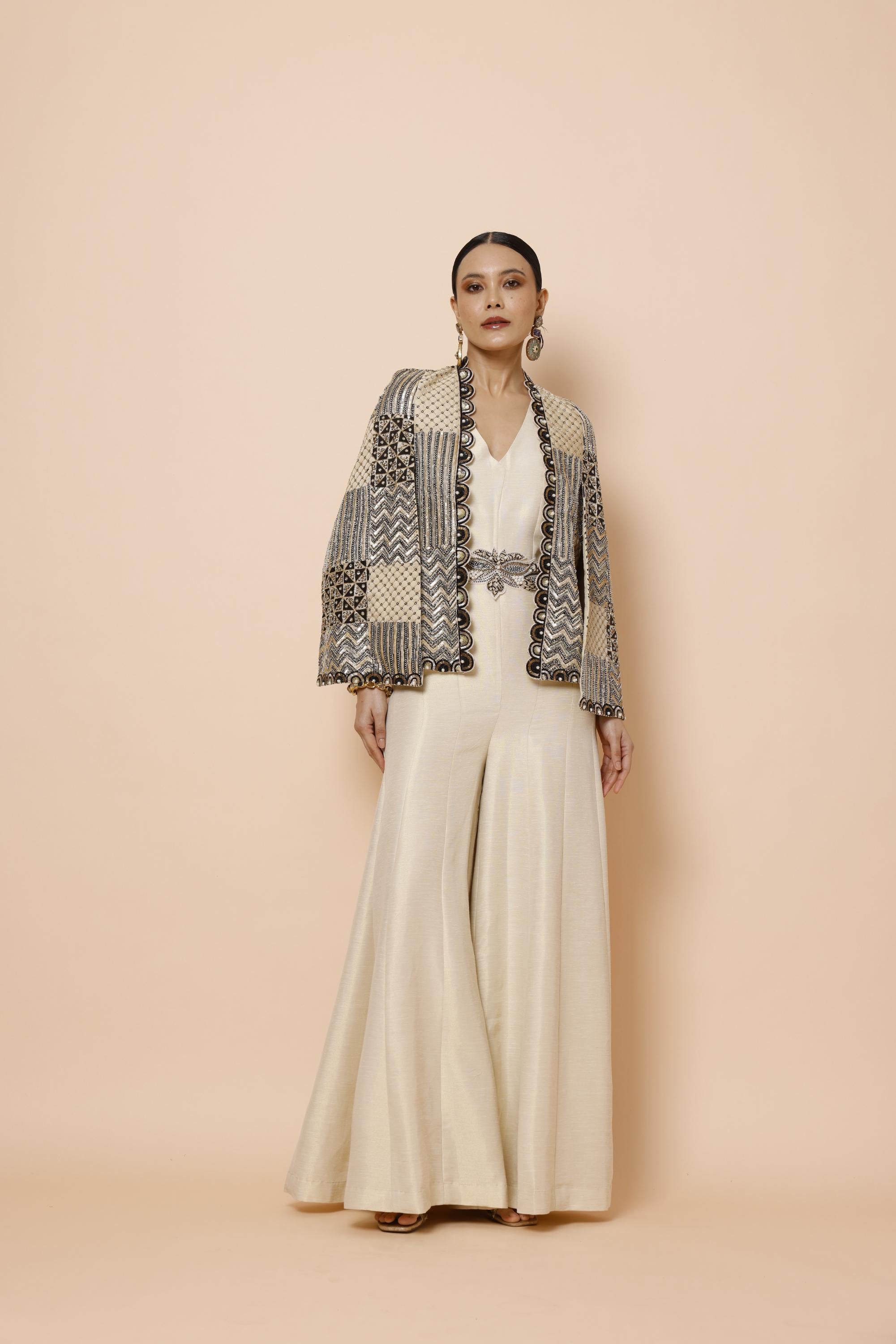 IVORY JUMPSUIT WITH BELT AND CAPE JACKET