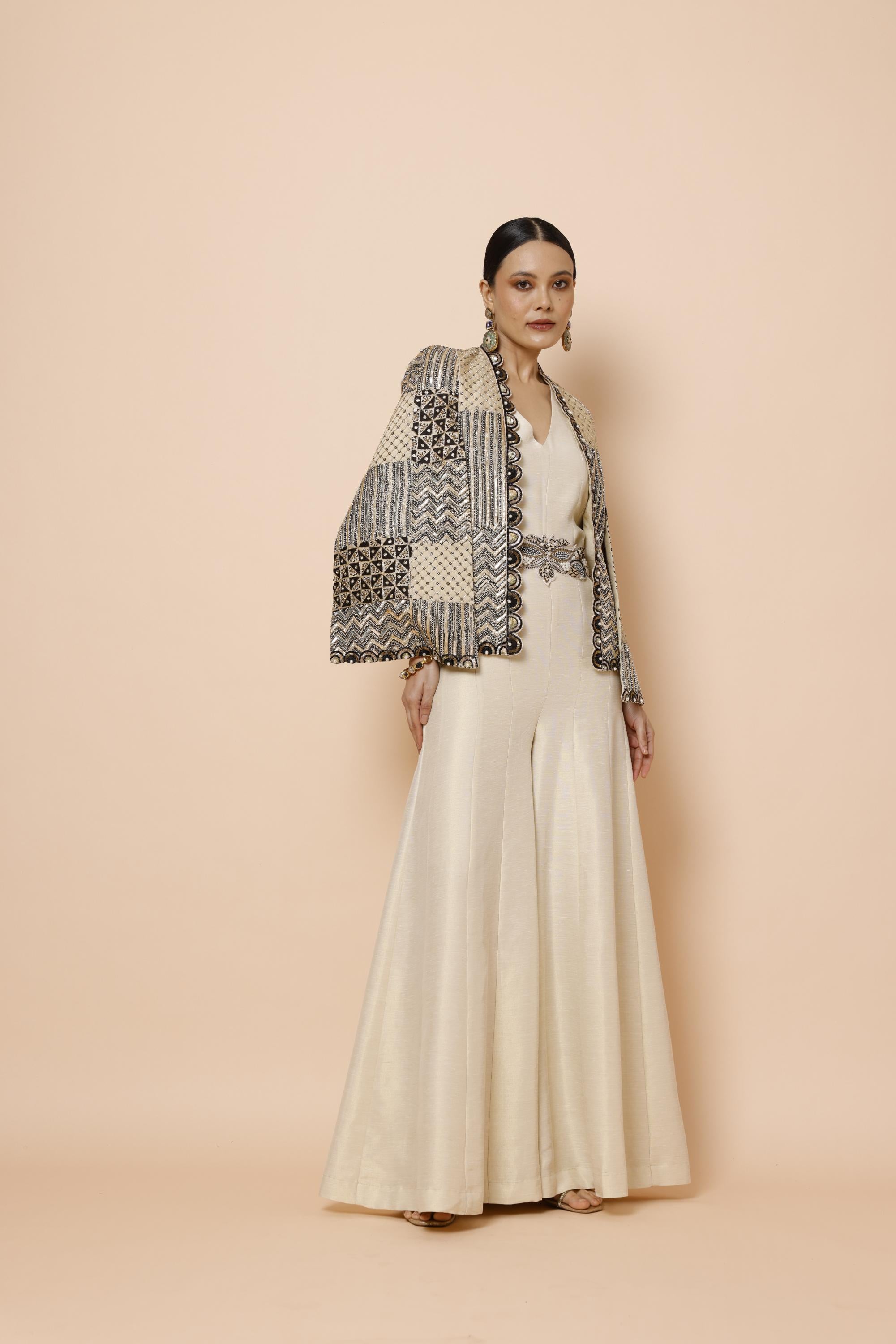IVORY JUMPSUIT WITH BELT AND CAPE JACKET