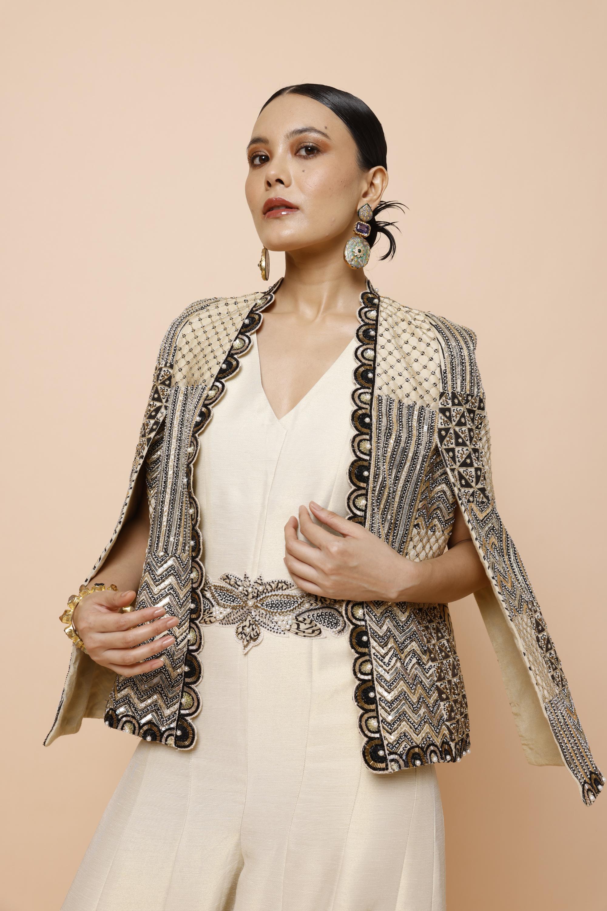 IVORY JUMPSUIT WITH BELT AND CAPE JACKET