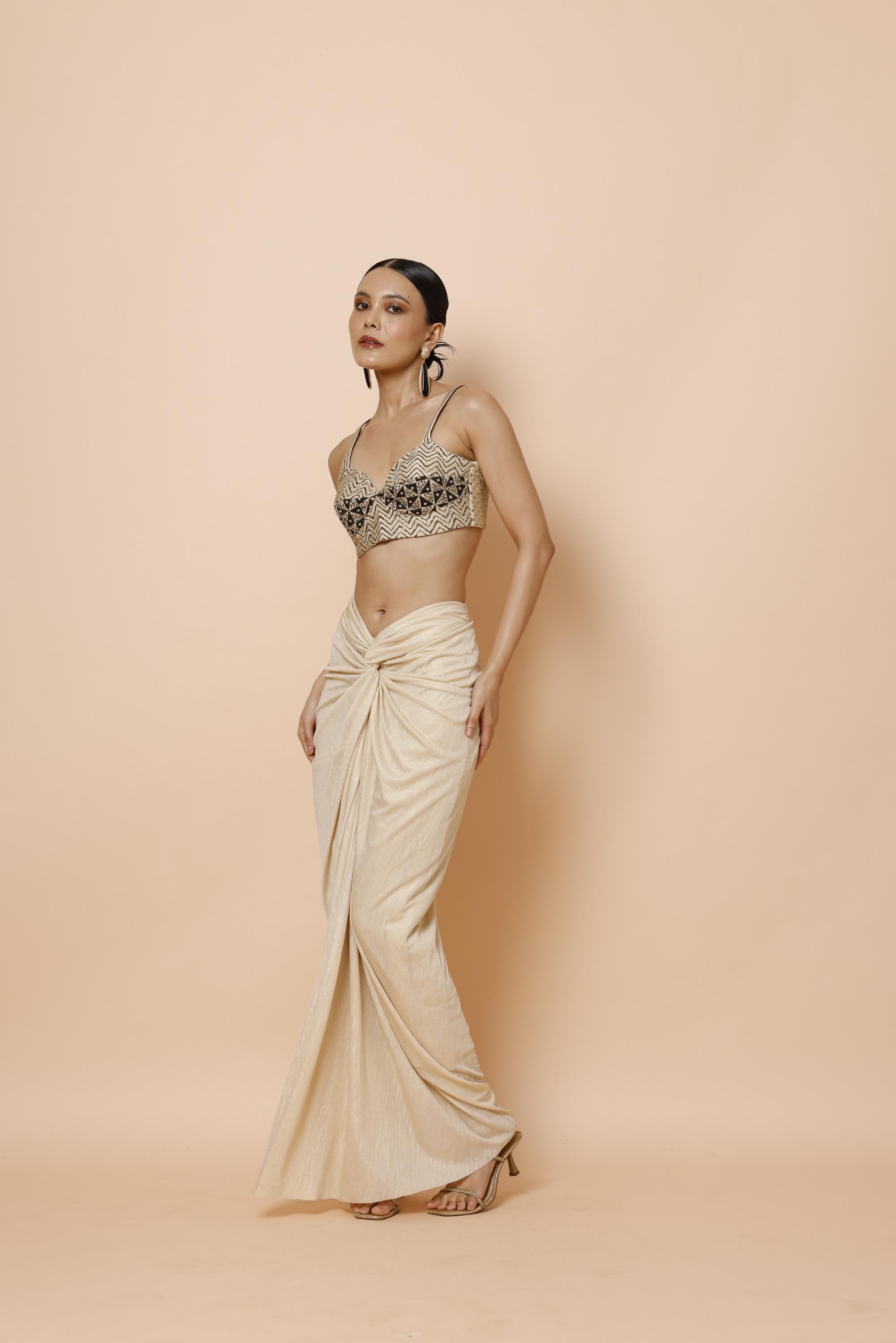 IVORY BRALETTE PAIRED WITH JACKET AND DRAPE SKIRT