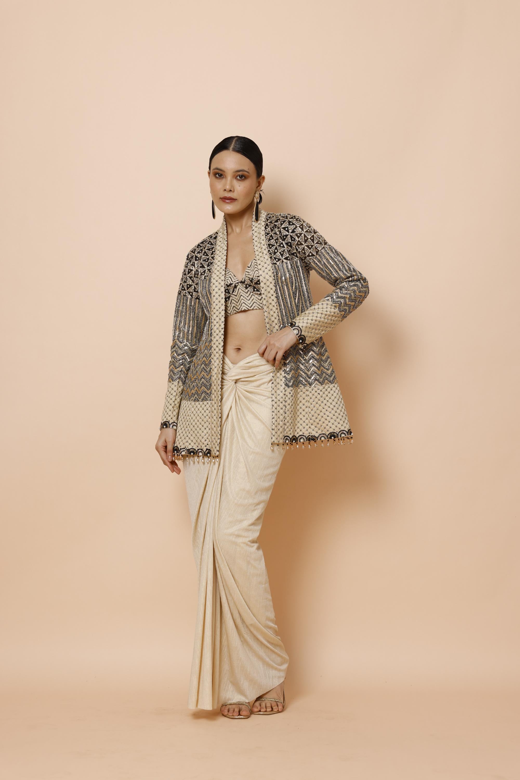IVORY BRALETTE PAIRED WITH JACKET AND DRAPE SKIRT