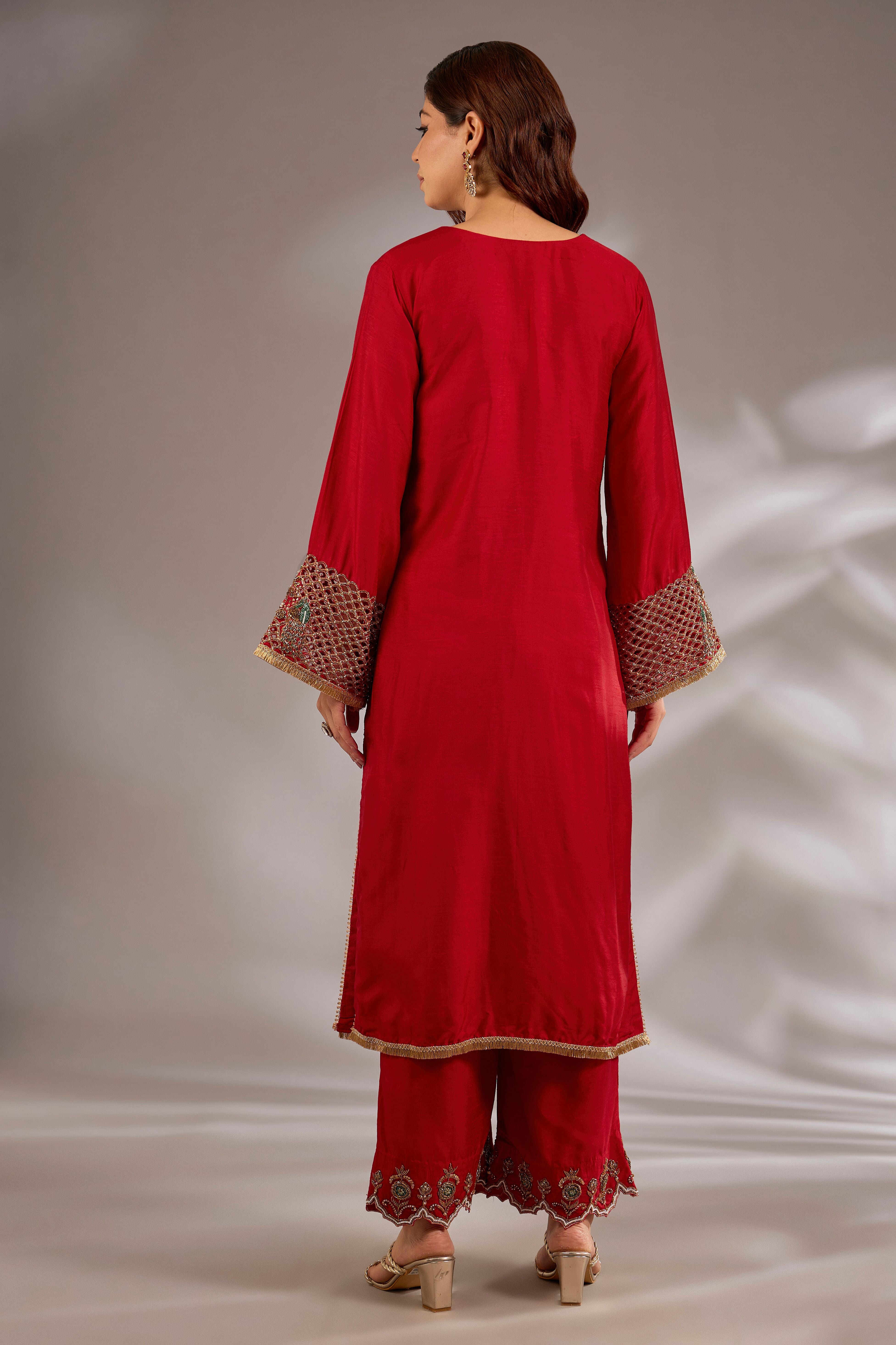 Straight kurta in silk base with hand embroidery.