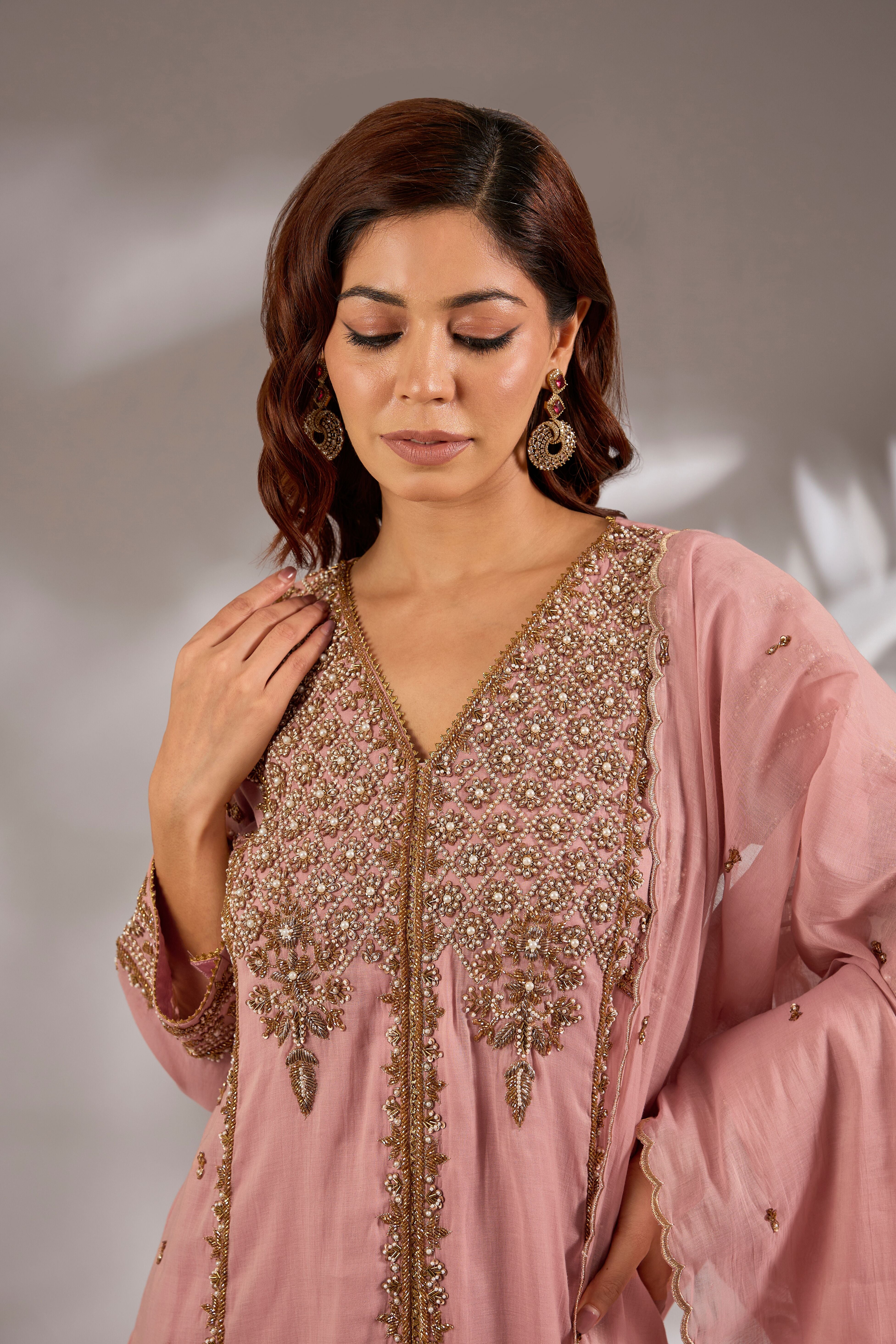 Flared kurta in mul chanderi base with hand embroidery.