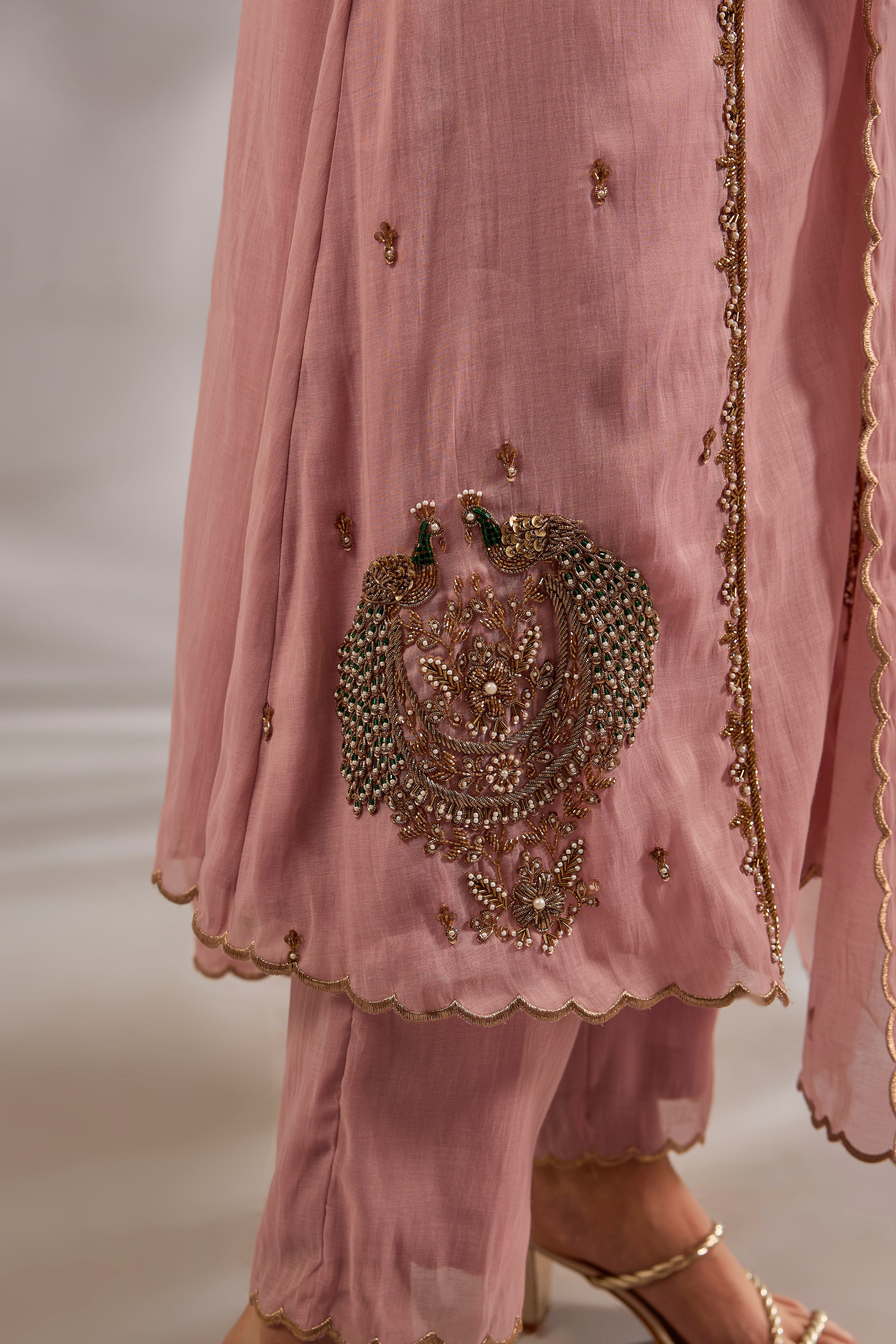 Flared kurta in mul chanderi base with hand embroidery.