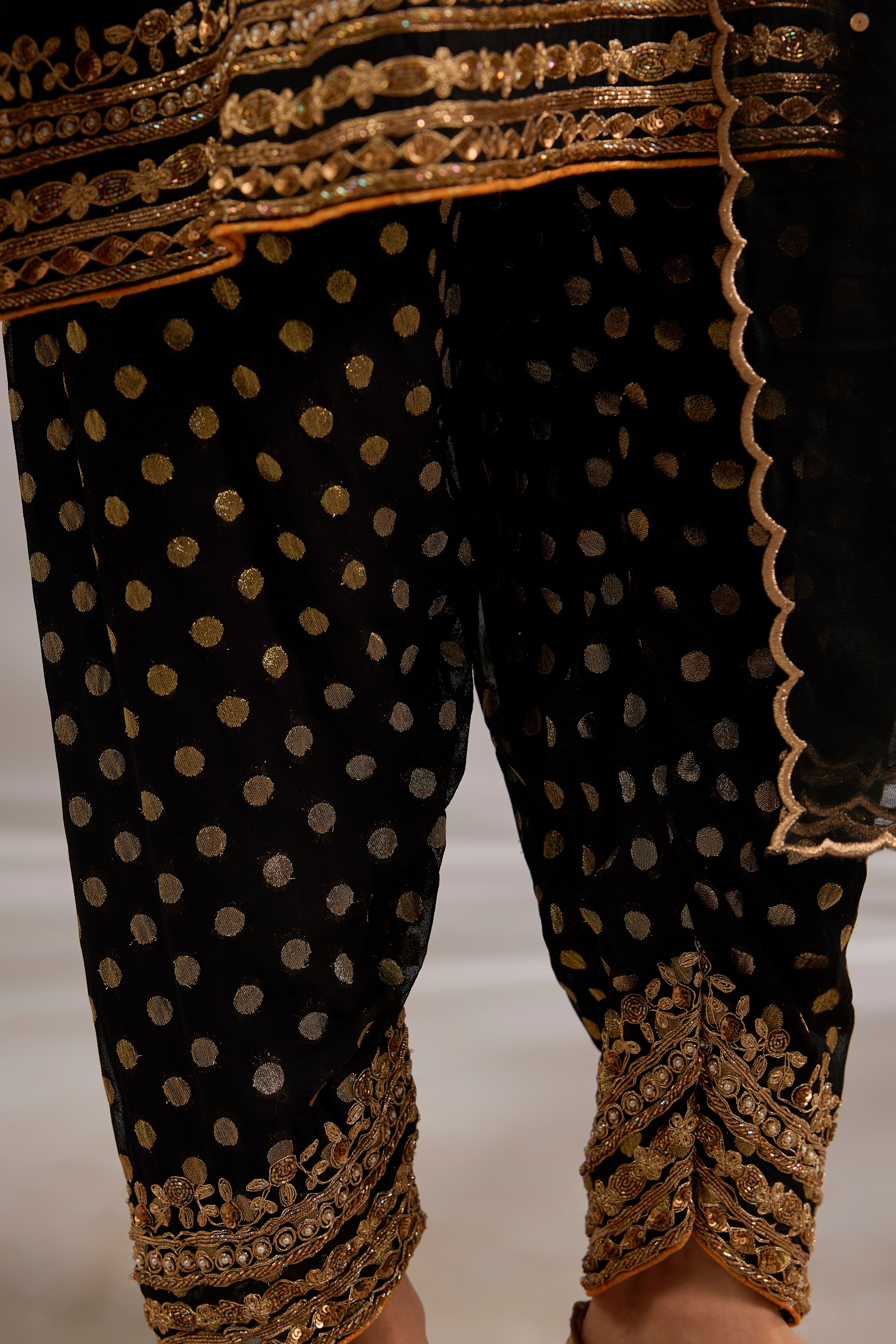 Short anarkali in silk base with dori hand embroidery.