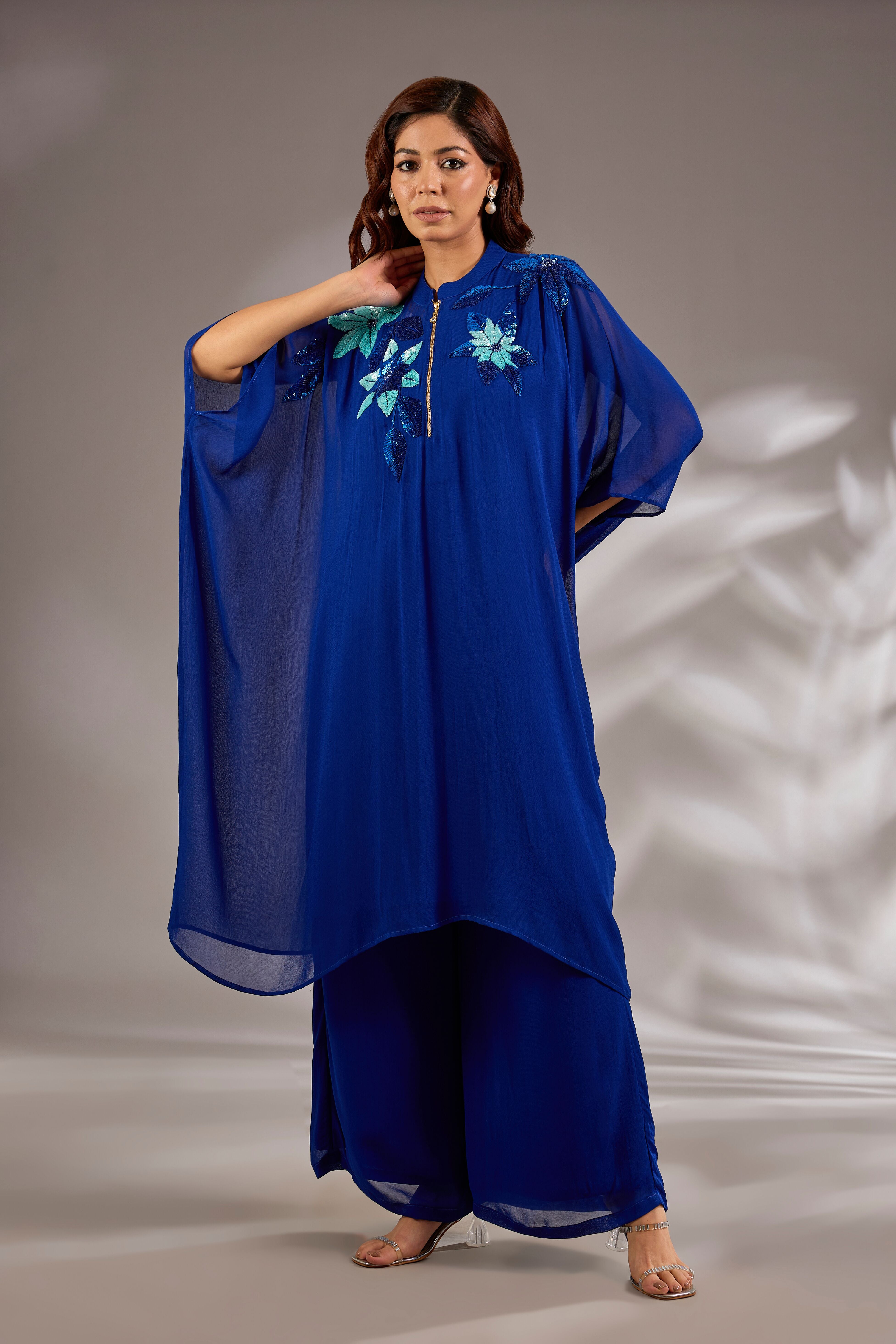 Kaftan in georgette base with sequins hand embroidery.