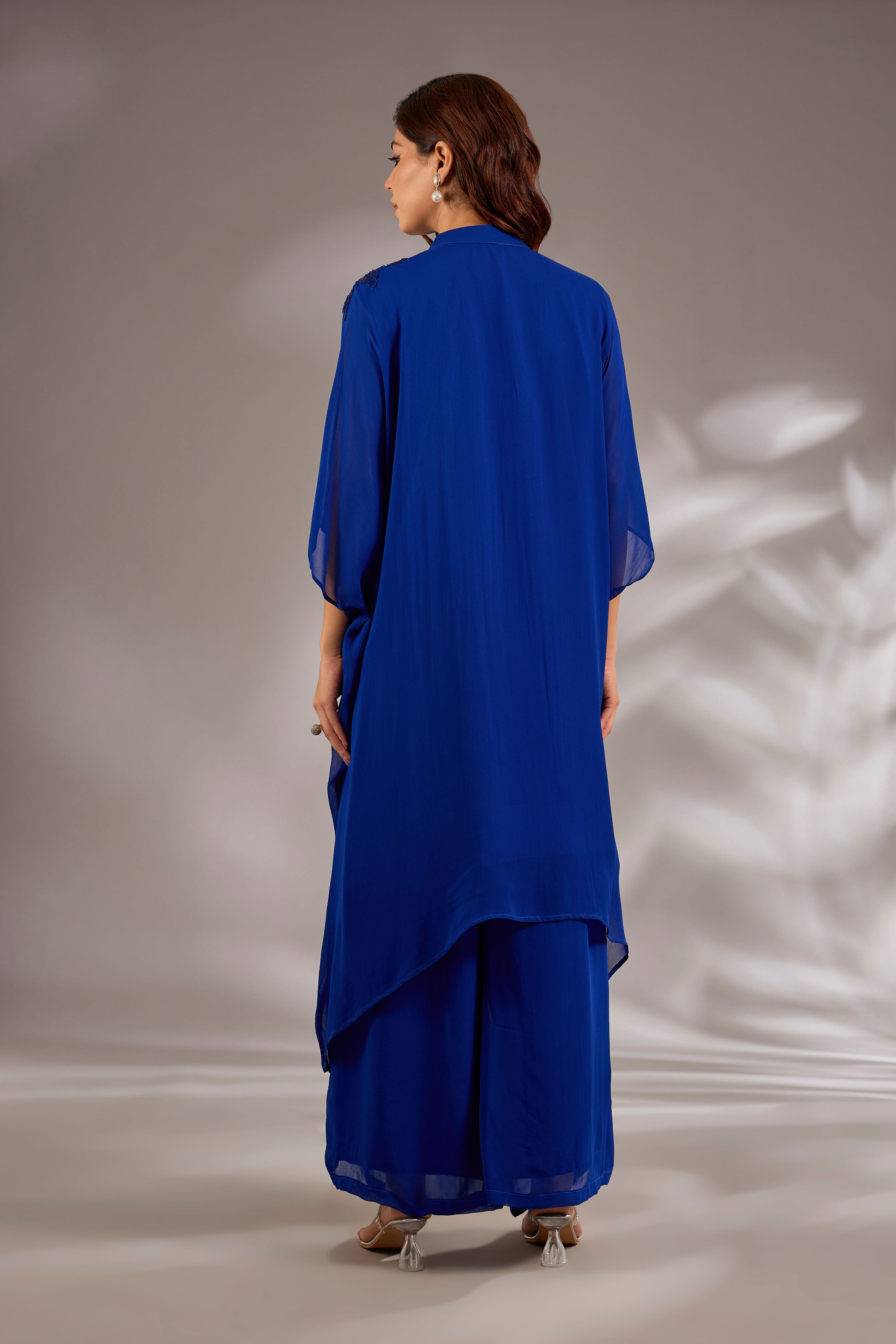 Kaftan in georgette base with sequins hand embroidery.