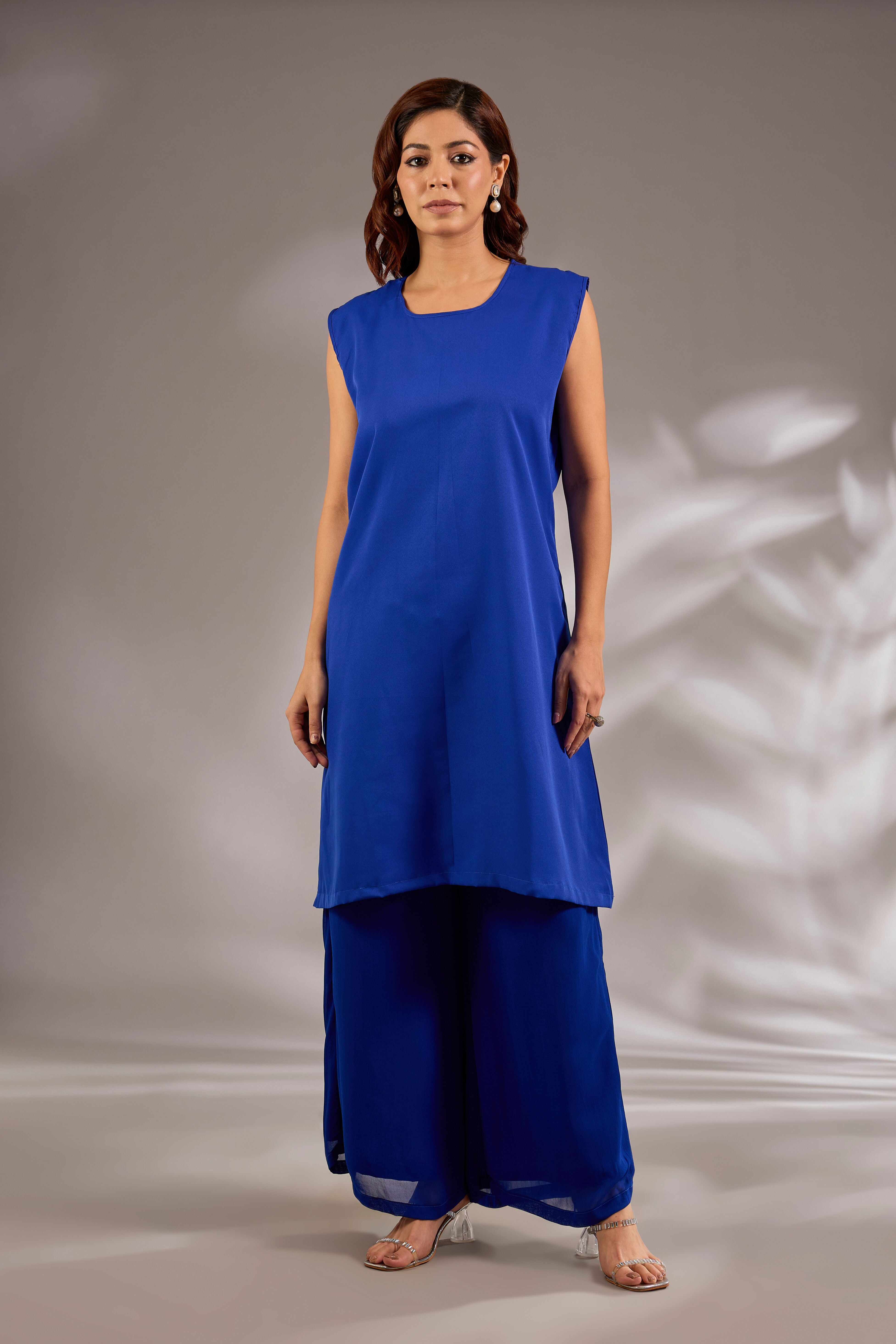 Kaftan in georgette base with sequins hand embroidery.