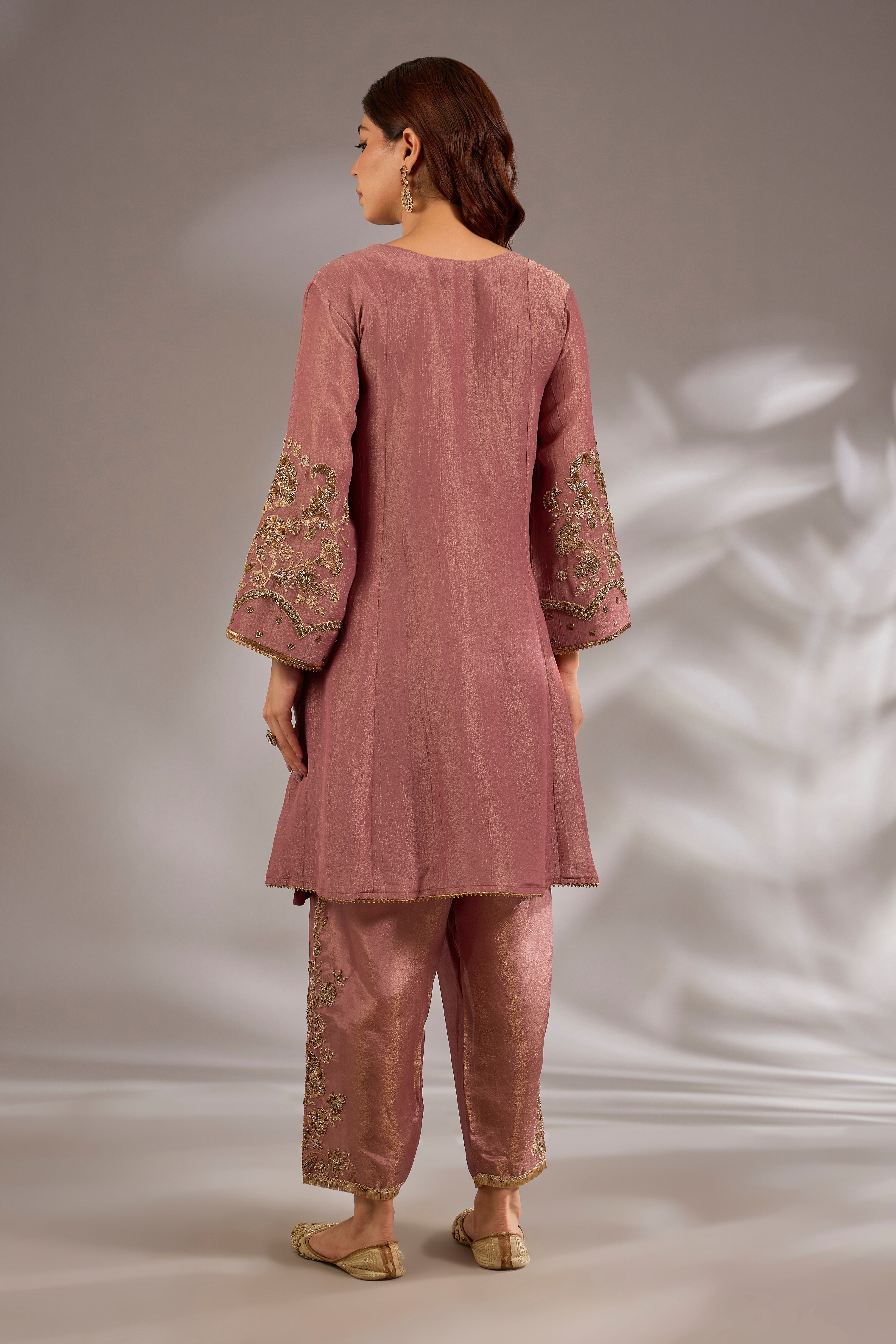 Anarkali in crush tissue base with dori hand embroidery.