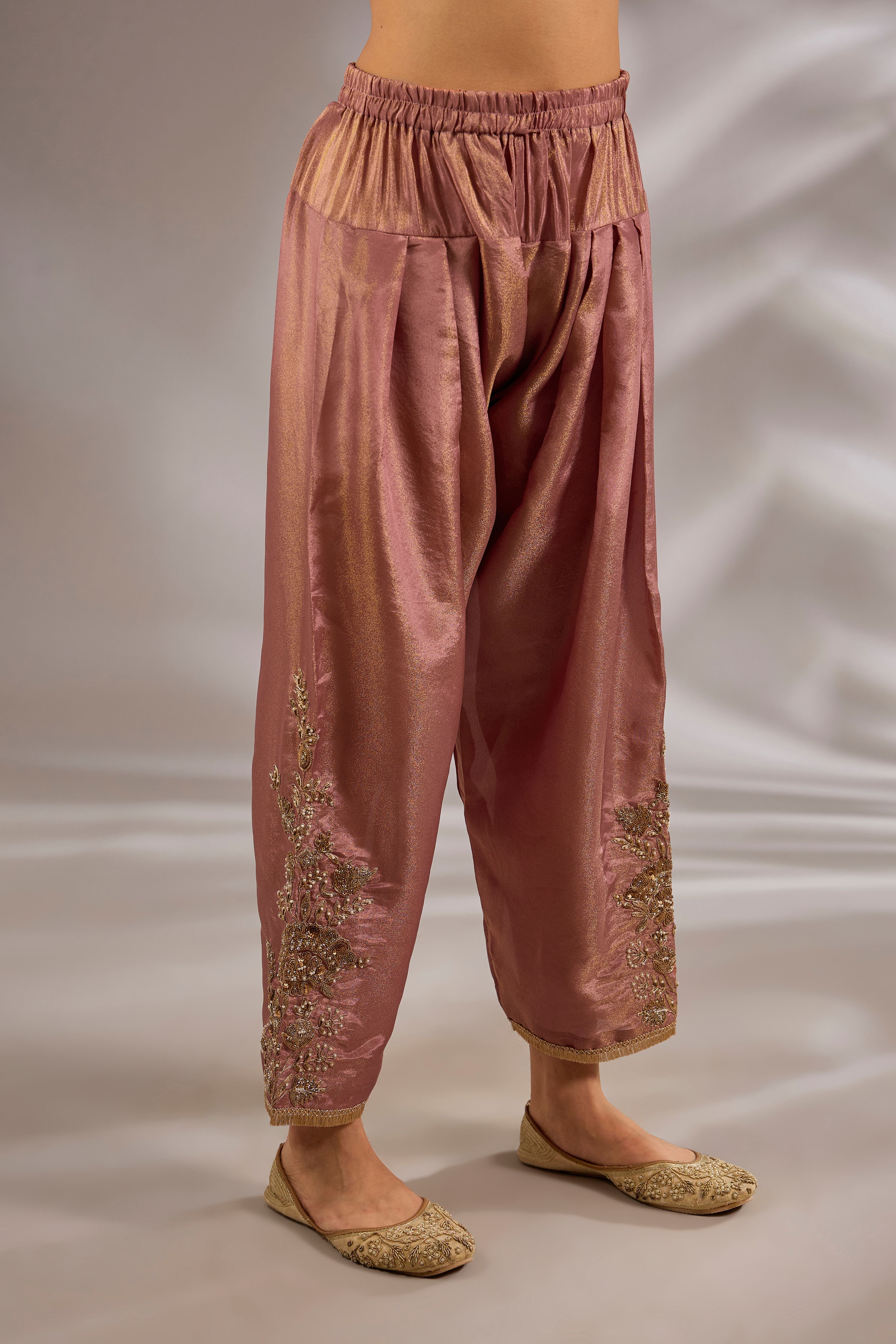 Anarkali in crush tissue base with dori hand embroidery.