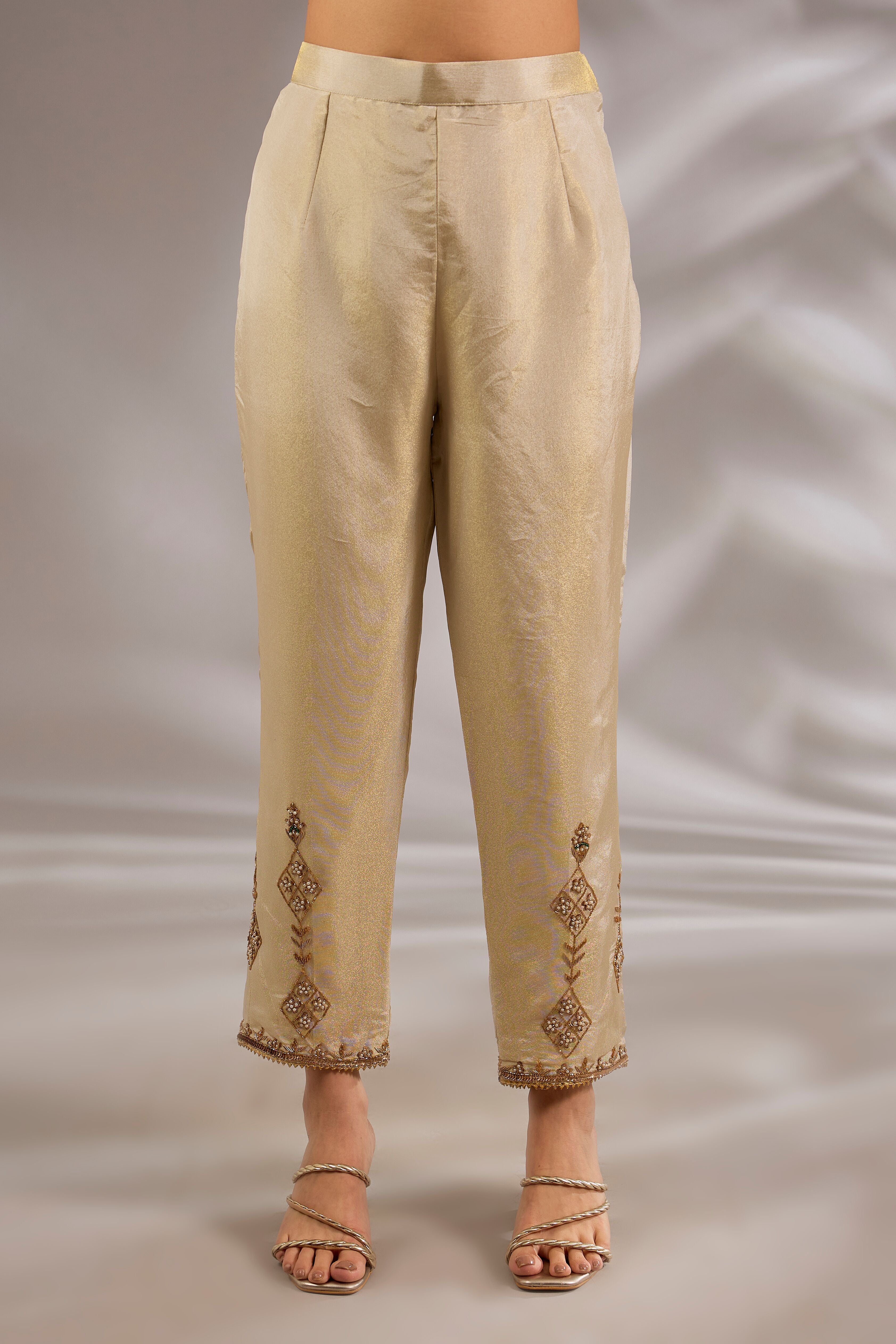 Princess flared kurta in tissue base with hand embroidery.