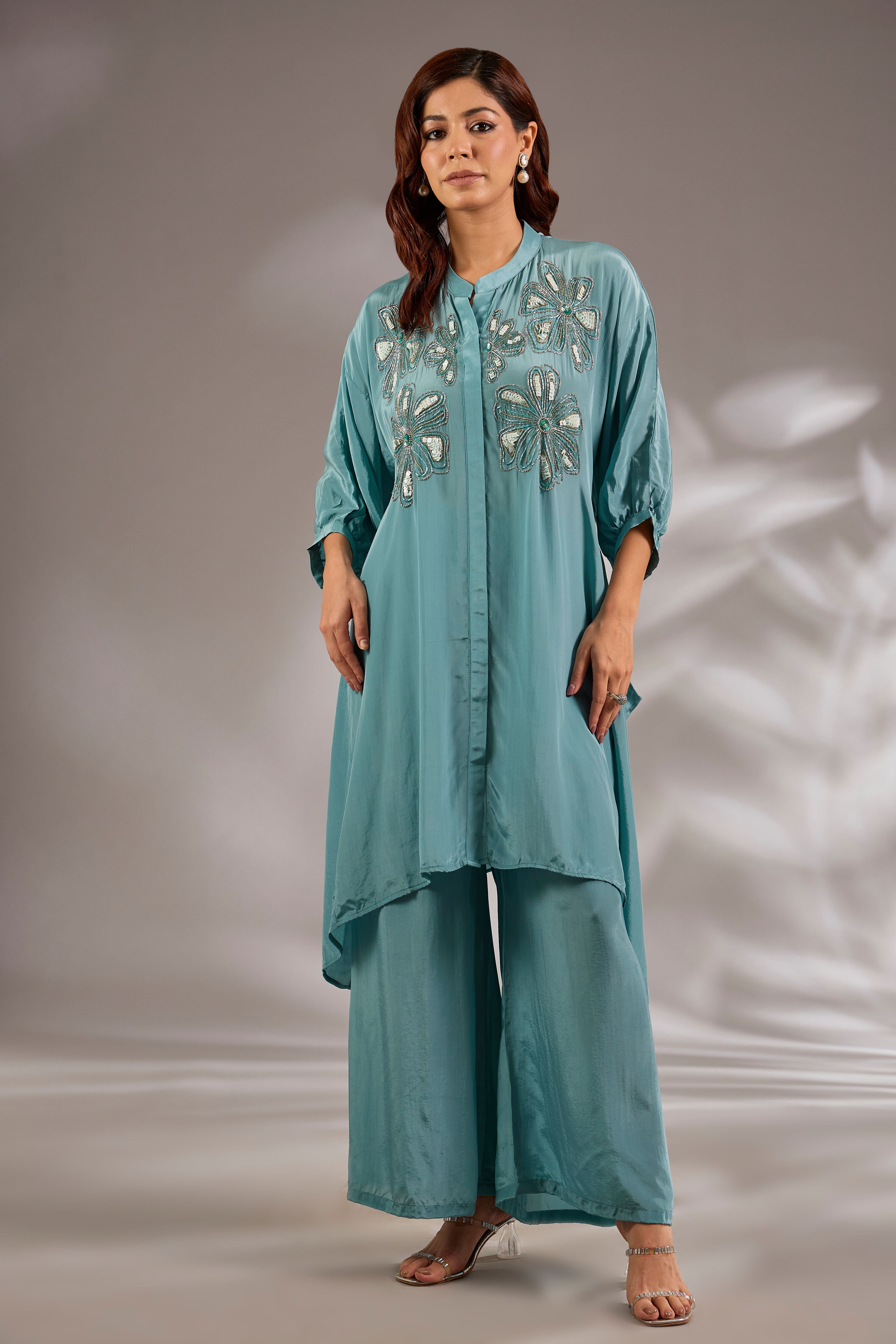 Asymmetric kurta in crepe base with sequins embroidery.